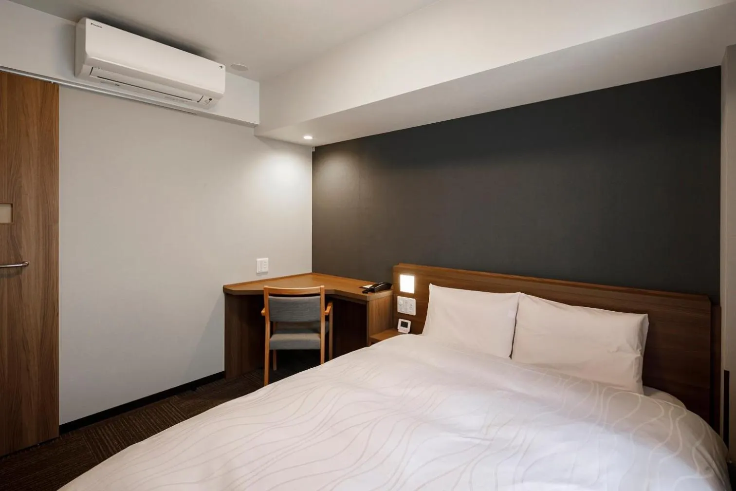 Bed in Dormy Inn Express Toyohashi