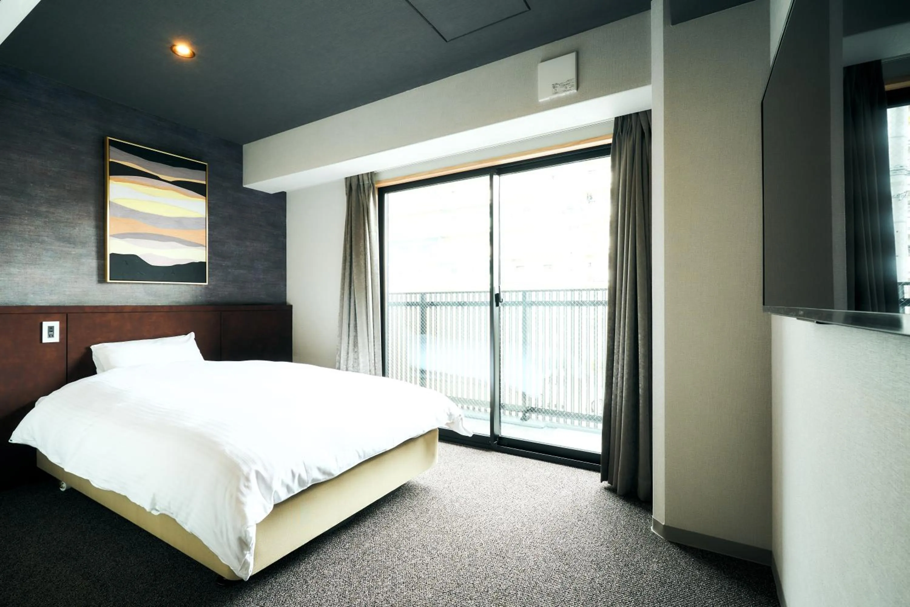 Bed in Rakuten STAY Kyoto Station