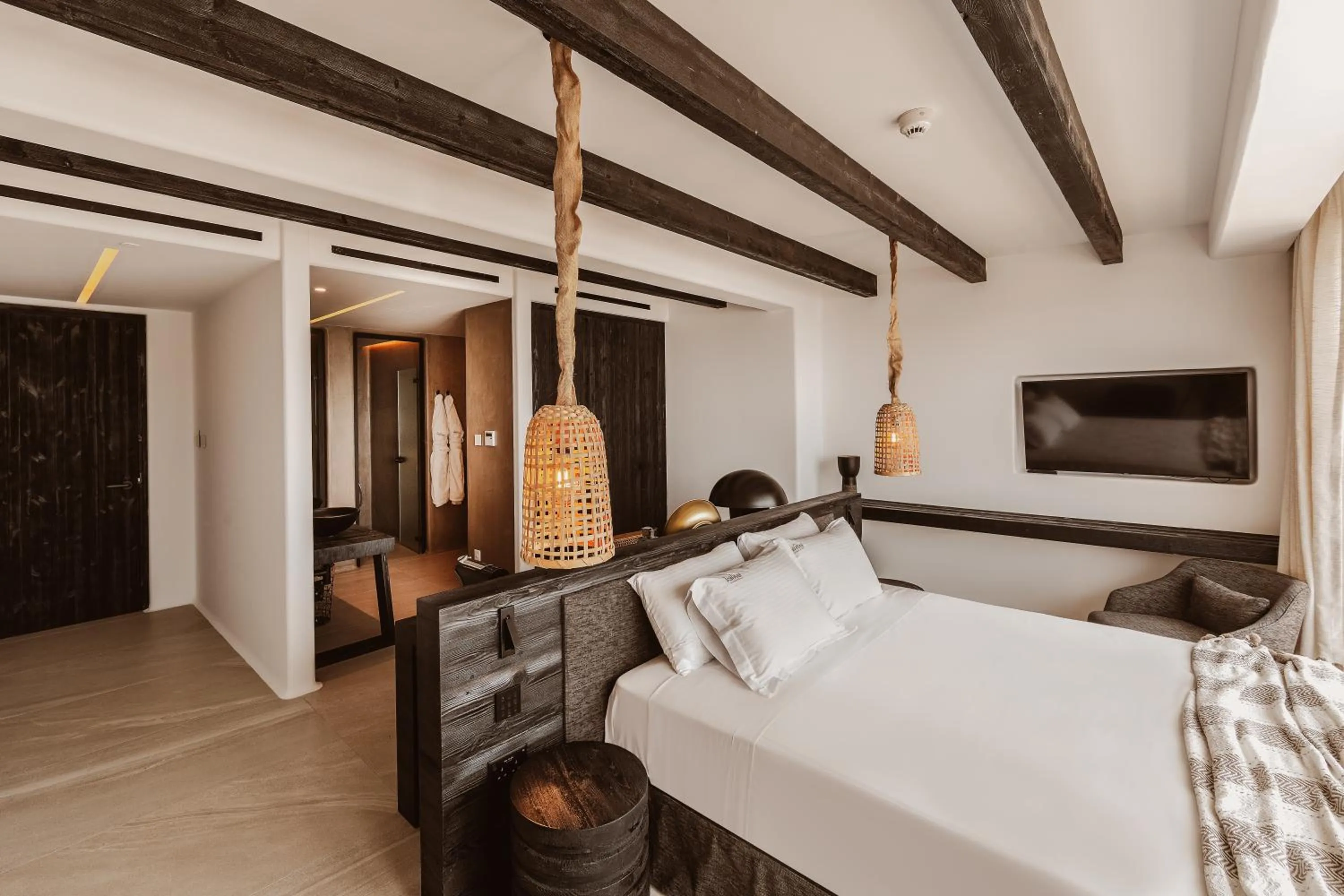 Bed in Kaliva Suites - Adults Only