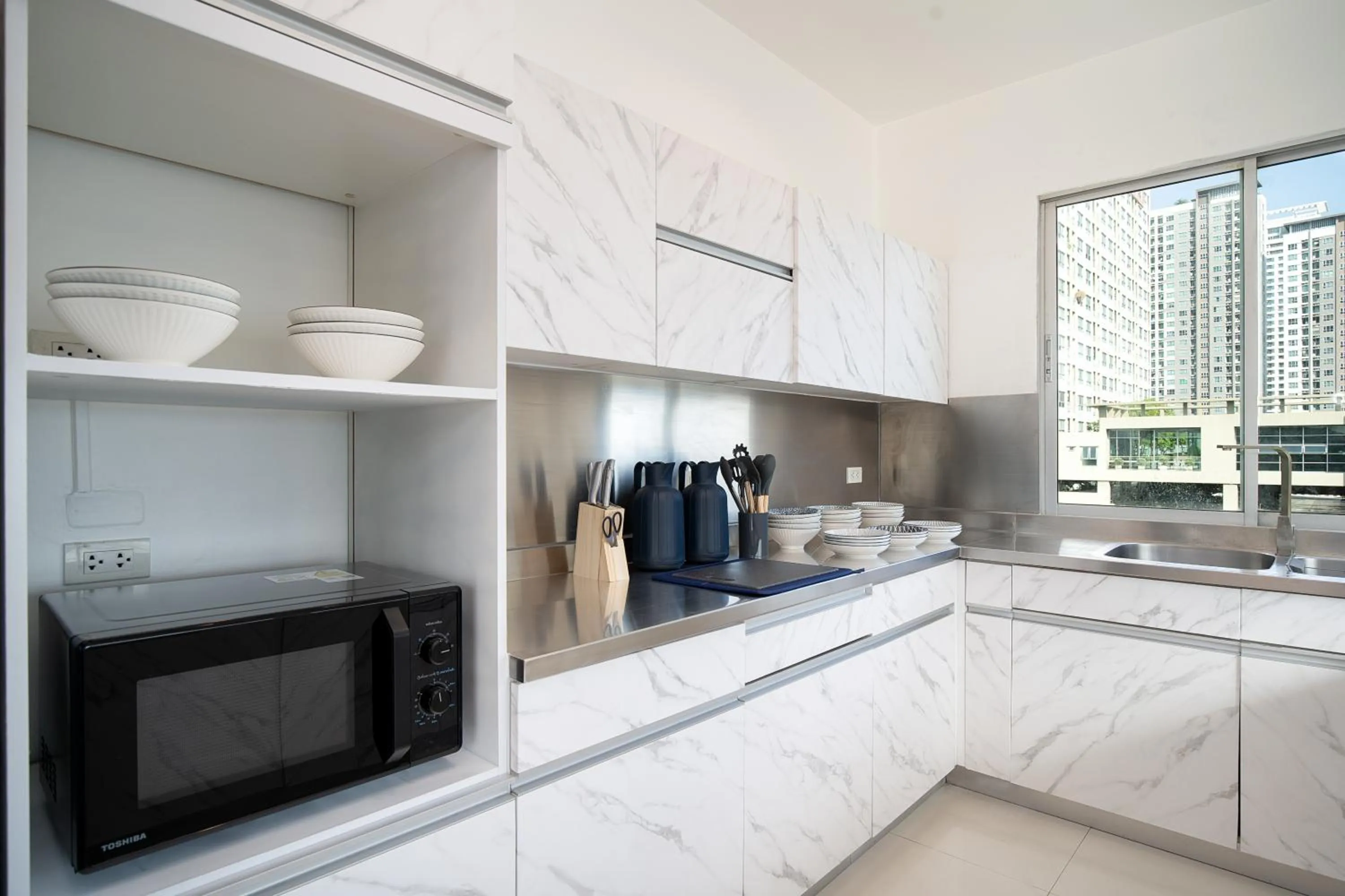 Communal kitchen in Capitel Rama 4