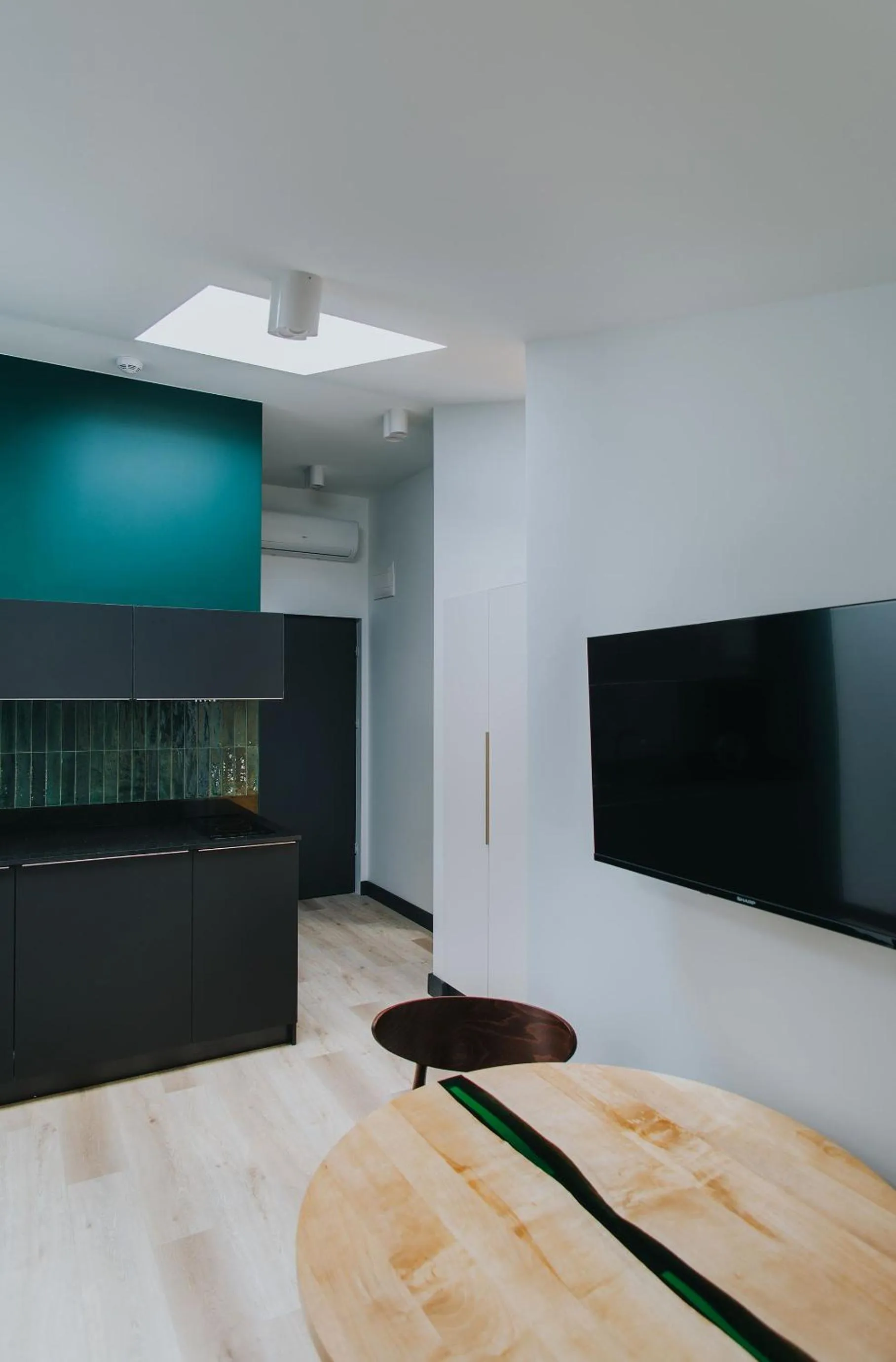 Communal lounge/ TV room in Apartamenty BIBLIO