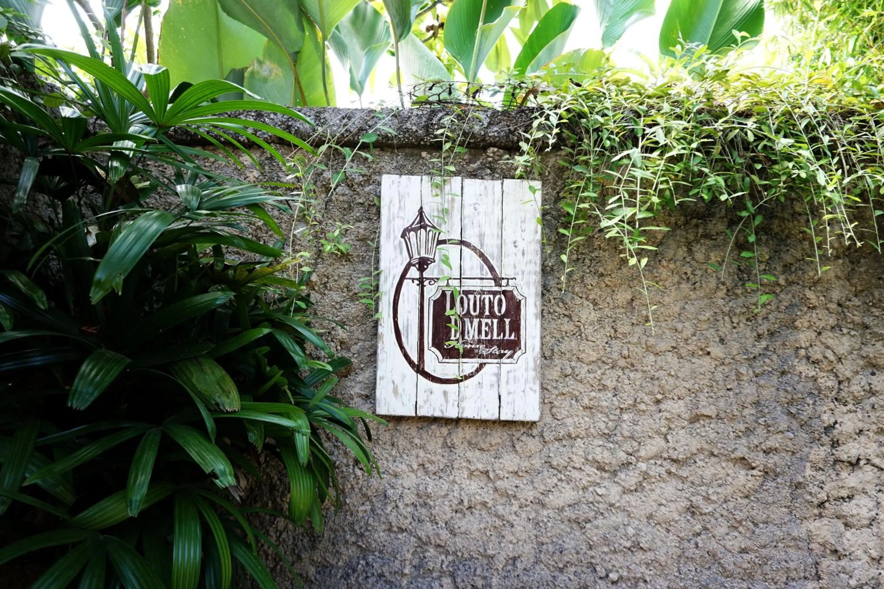 Property logo or sign in Louto Dmell Villa & Deluxe