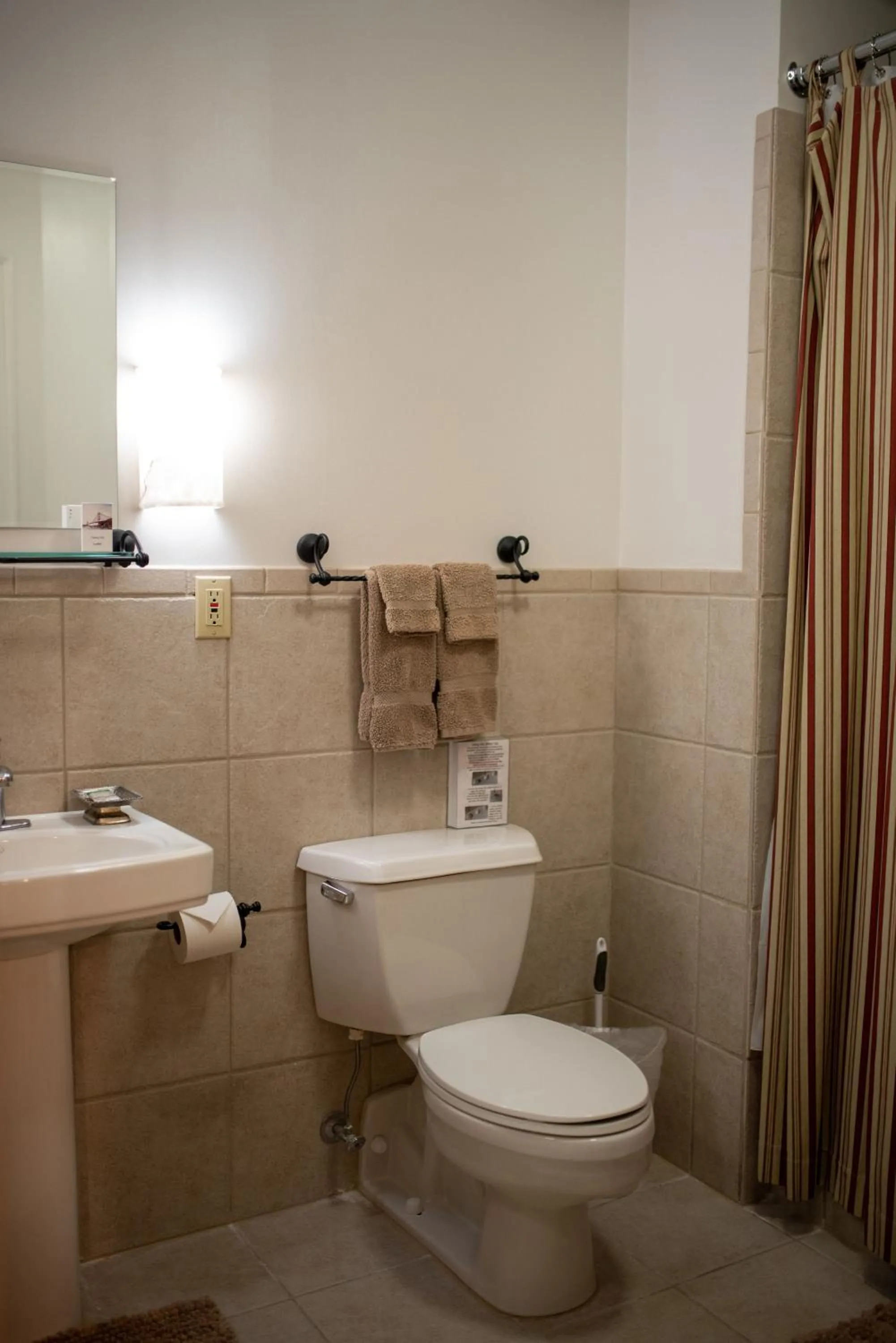 Toilet in Fountainview Inn