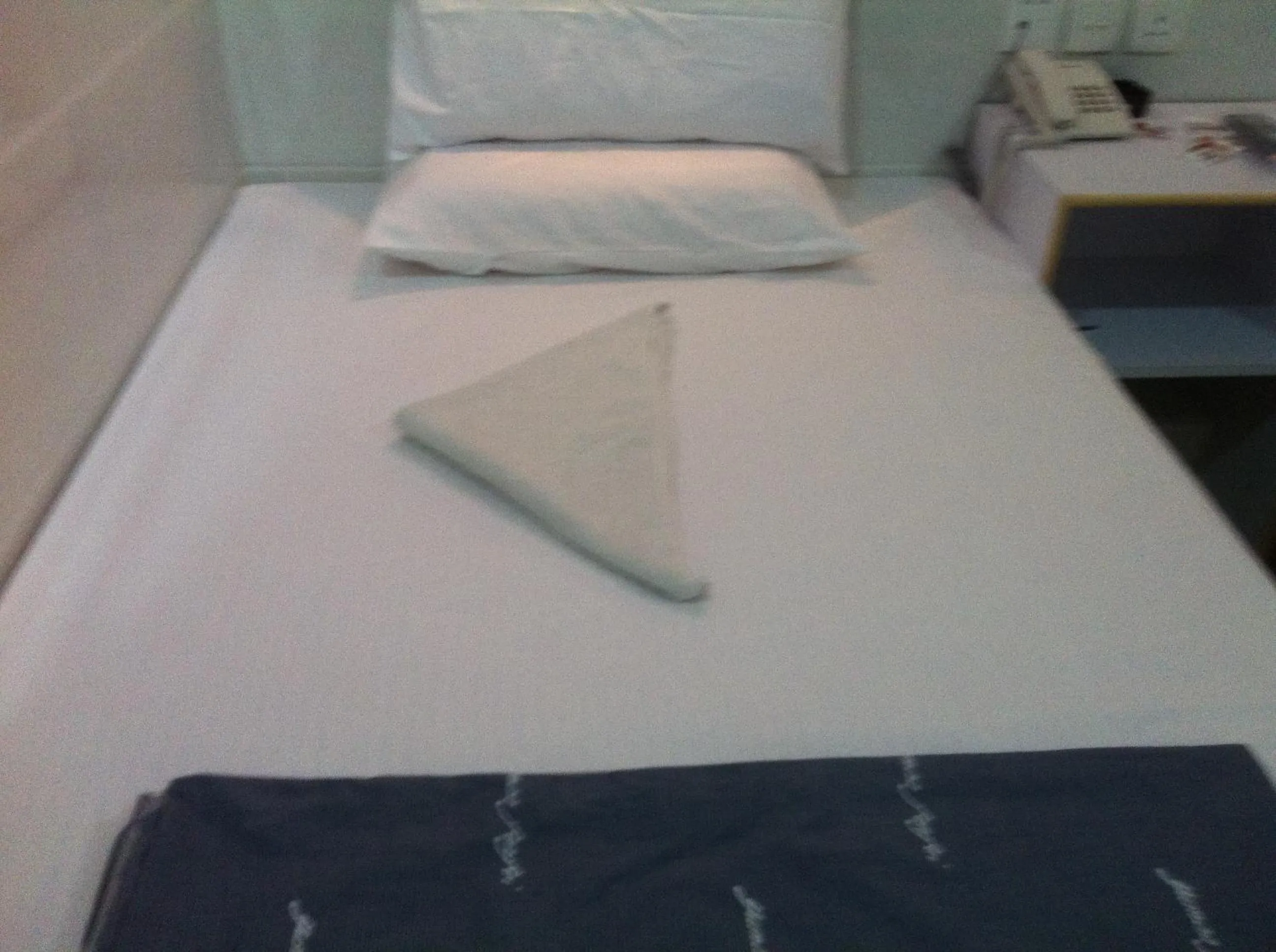 Bed in New Cosmos Hotel