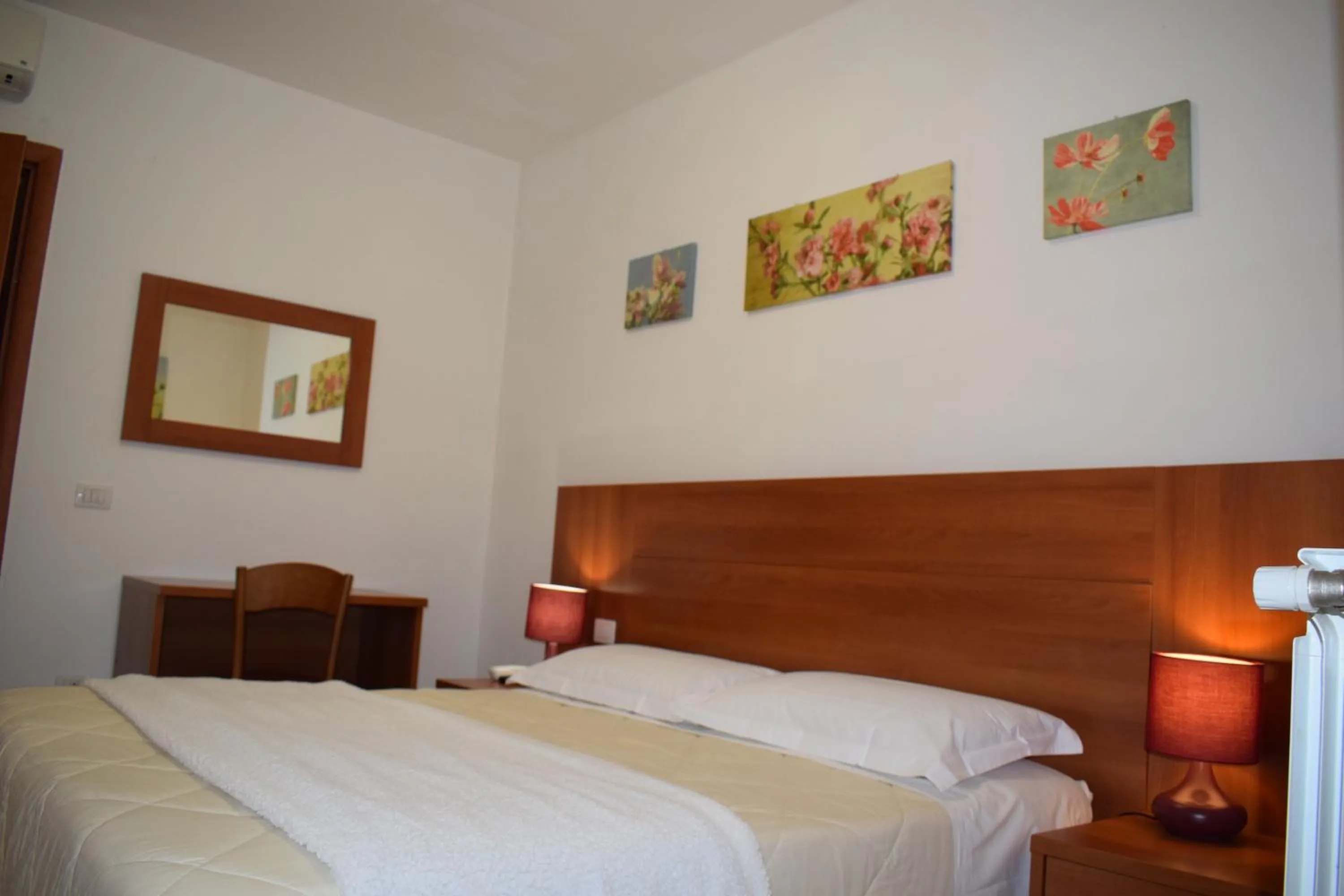 Bed in Hotel Dalmazia