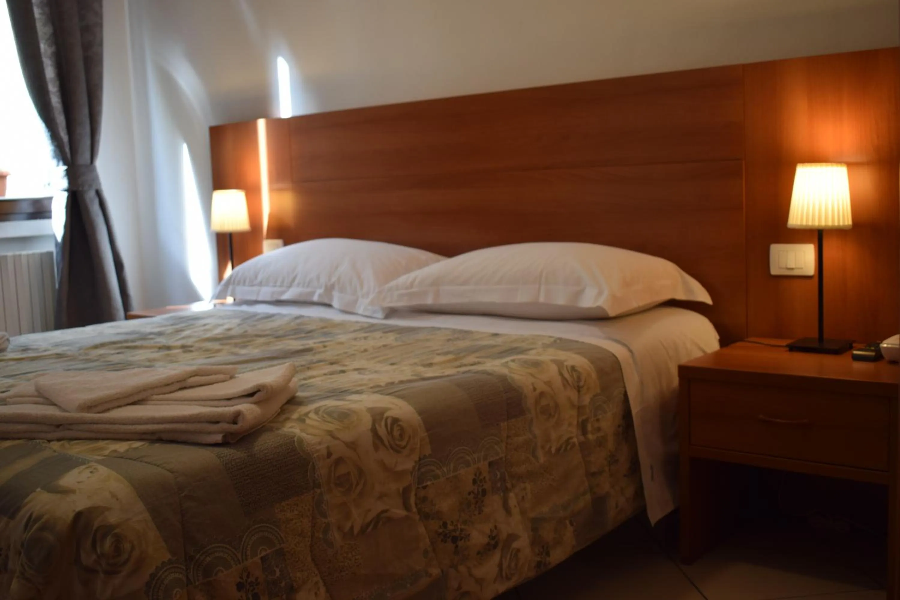 Bed in Hotel Dalmazia