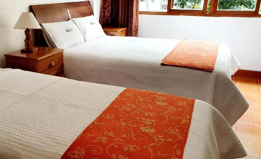 Bed in CHASKA MACHUPICCHU