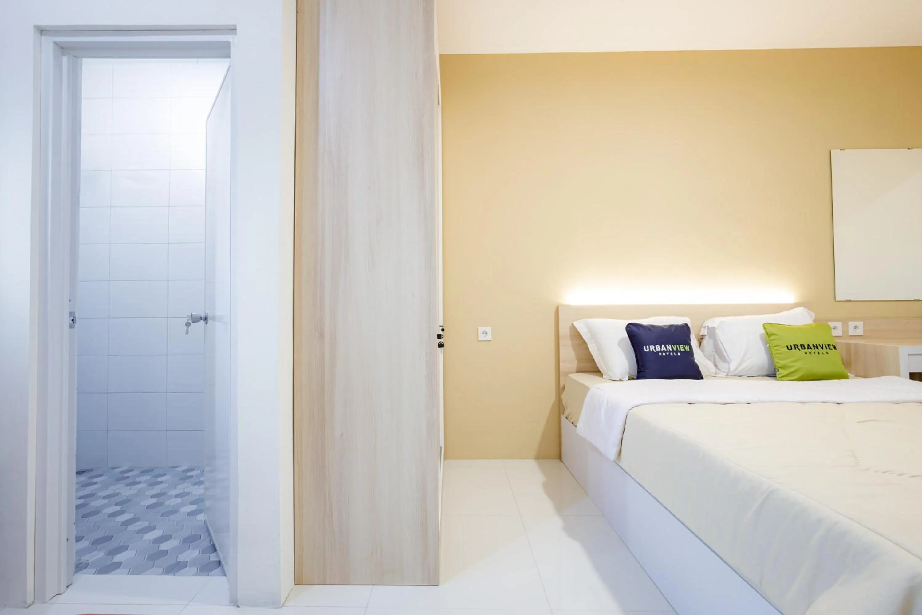 Bedroom, Bed in Urbanview Hotel Syariah The Ragunan Residence