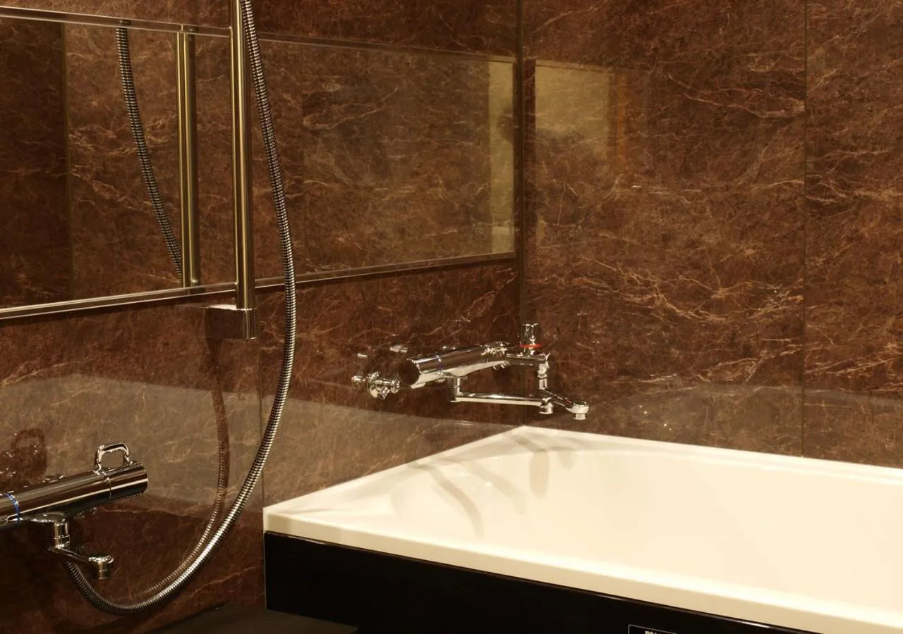 Bathroom in Niseko Hot Spring Ikoino Yuyado Iroha