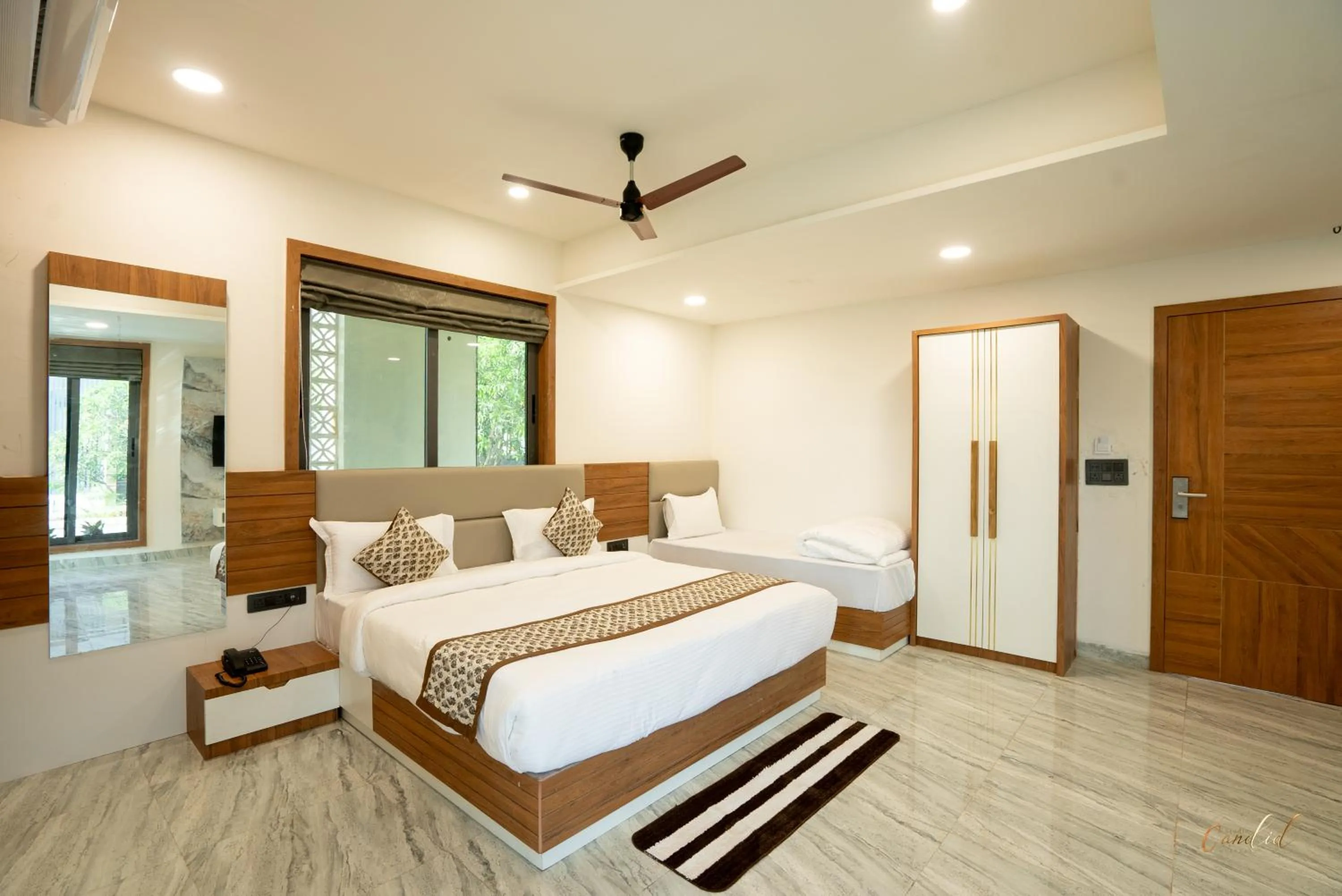 Bedroom in Daksh Eden Greenz -A Luxury Resort in Sasan Gir