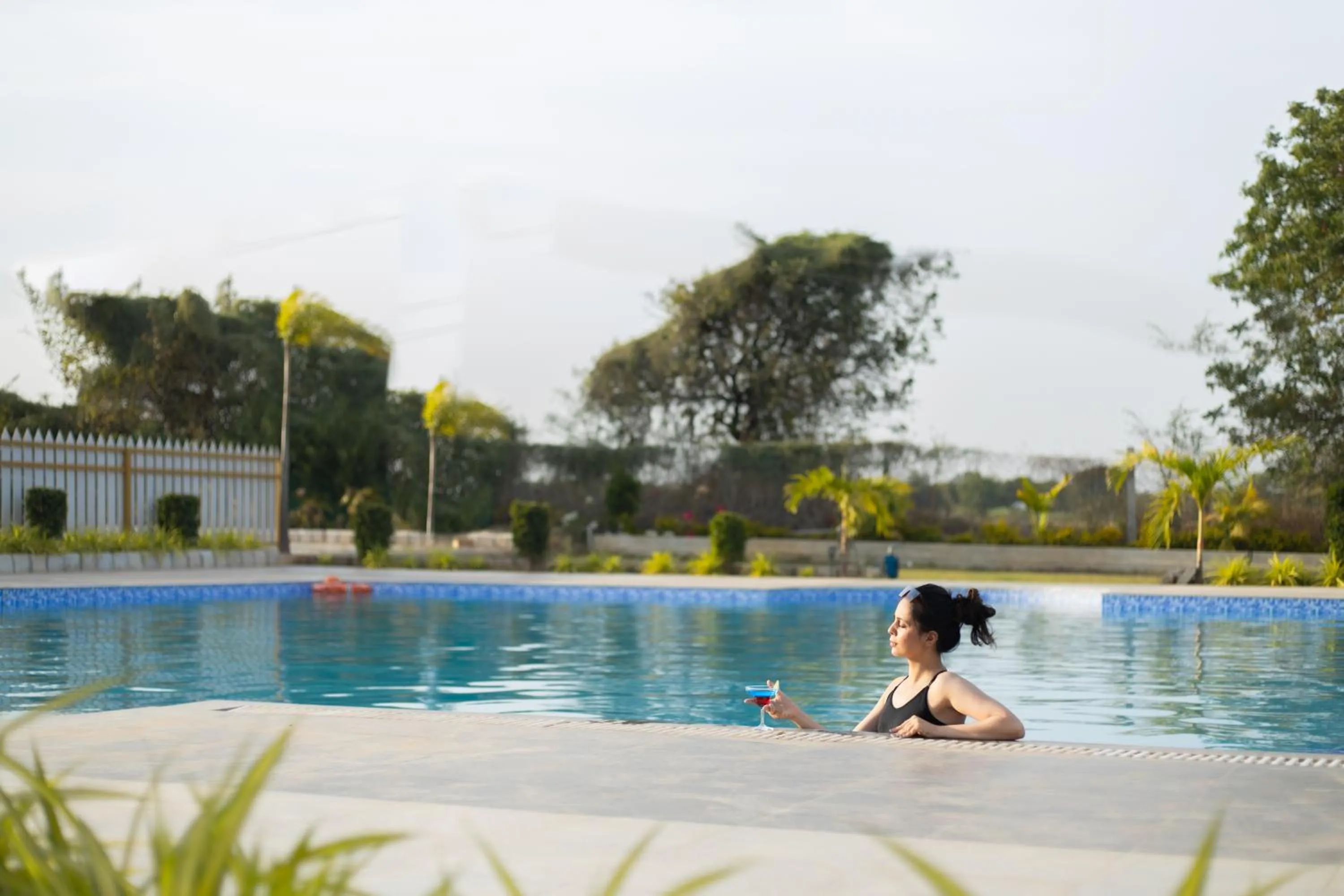 Swimming pool in Daksh Eden Greenz -A Luxury Resort in Sasan Gir