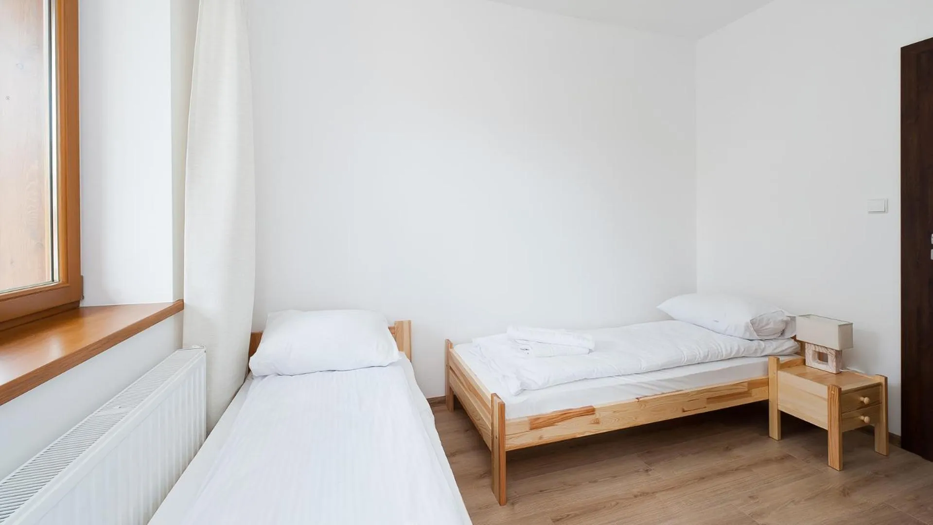 Photo of the whole room, Bed in Apartamenty Lipki Park, Sun & Snow