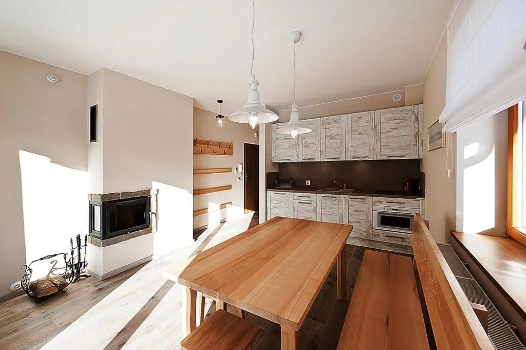 Kitchen or kitchenette in Apartamenty Lipki Park, Sun & Snow