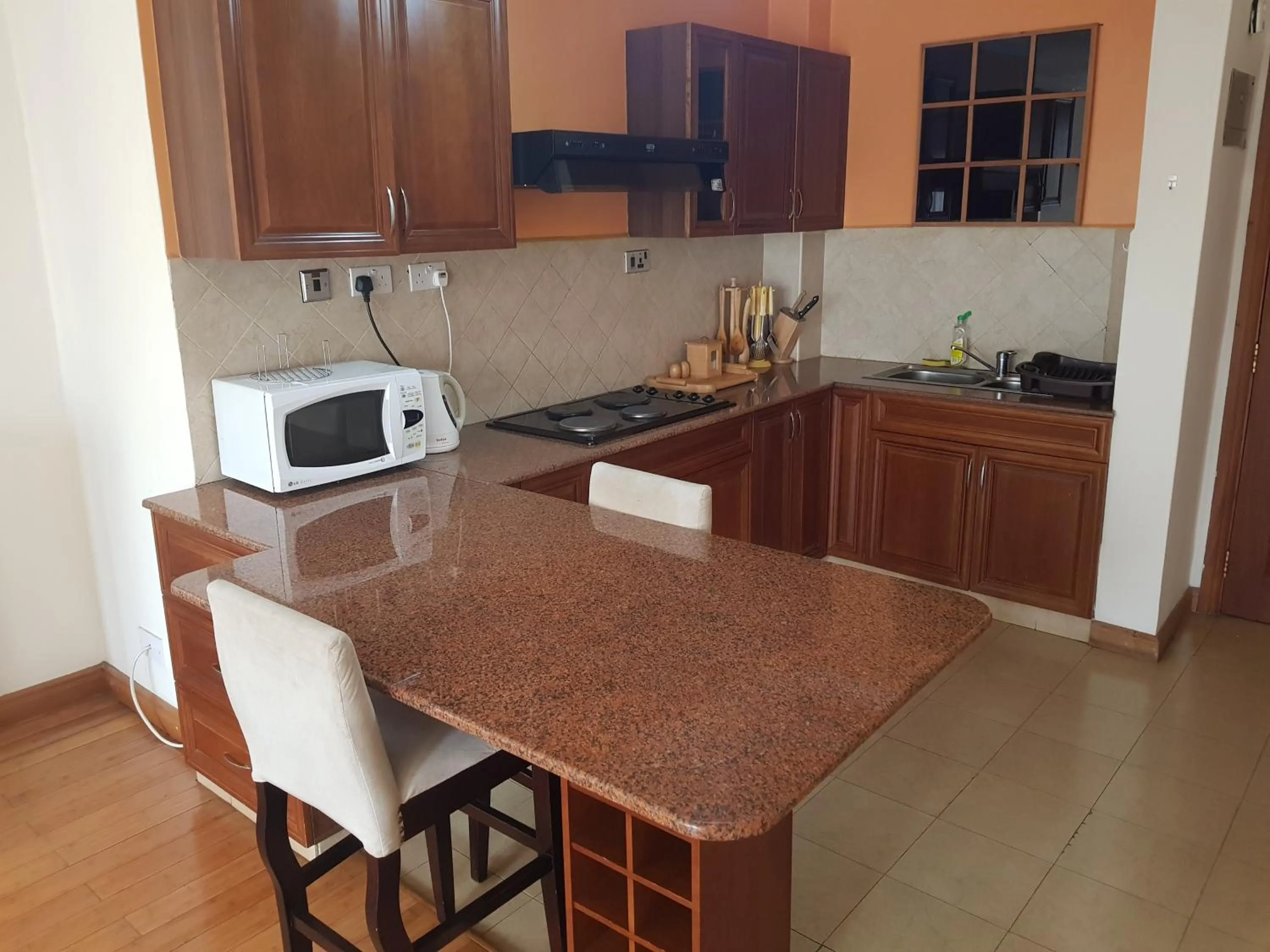 Kitchen or kitchenette in Natural Oak Apartments