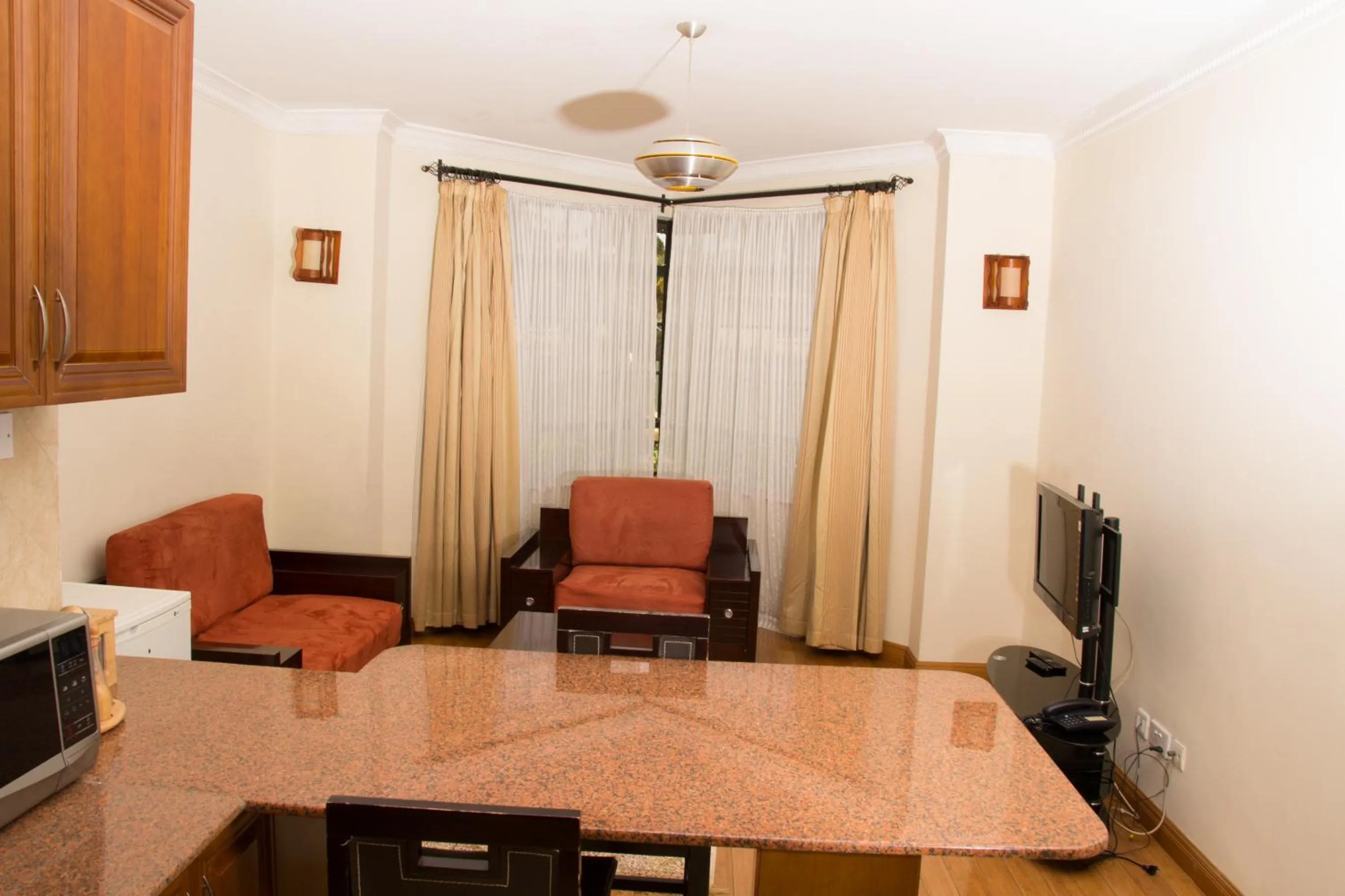 Communal lounge/ TV room in Natural Oak Apartments