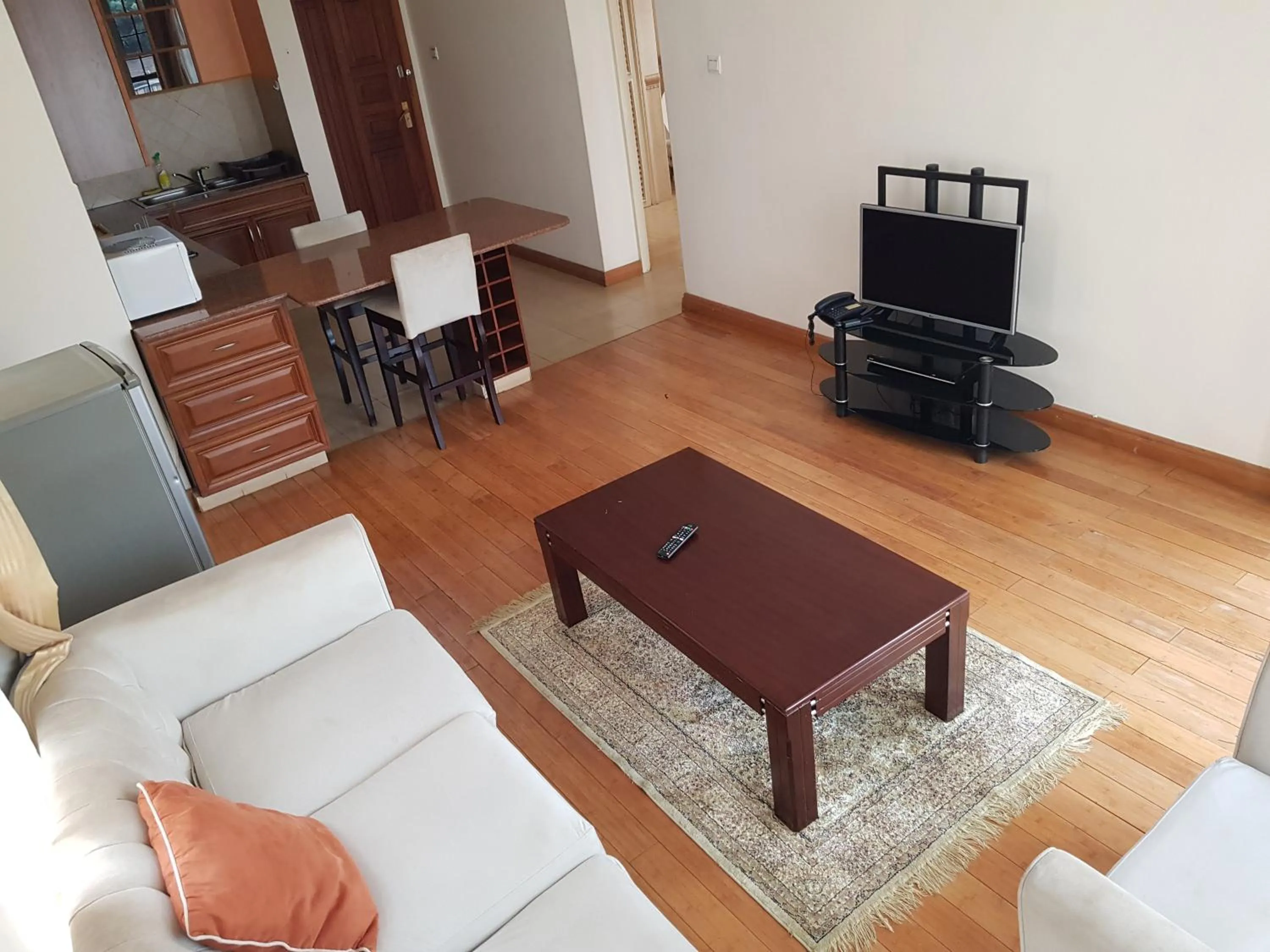 Living room in Natural Oak Apartments