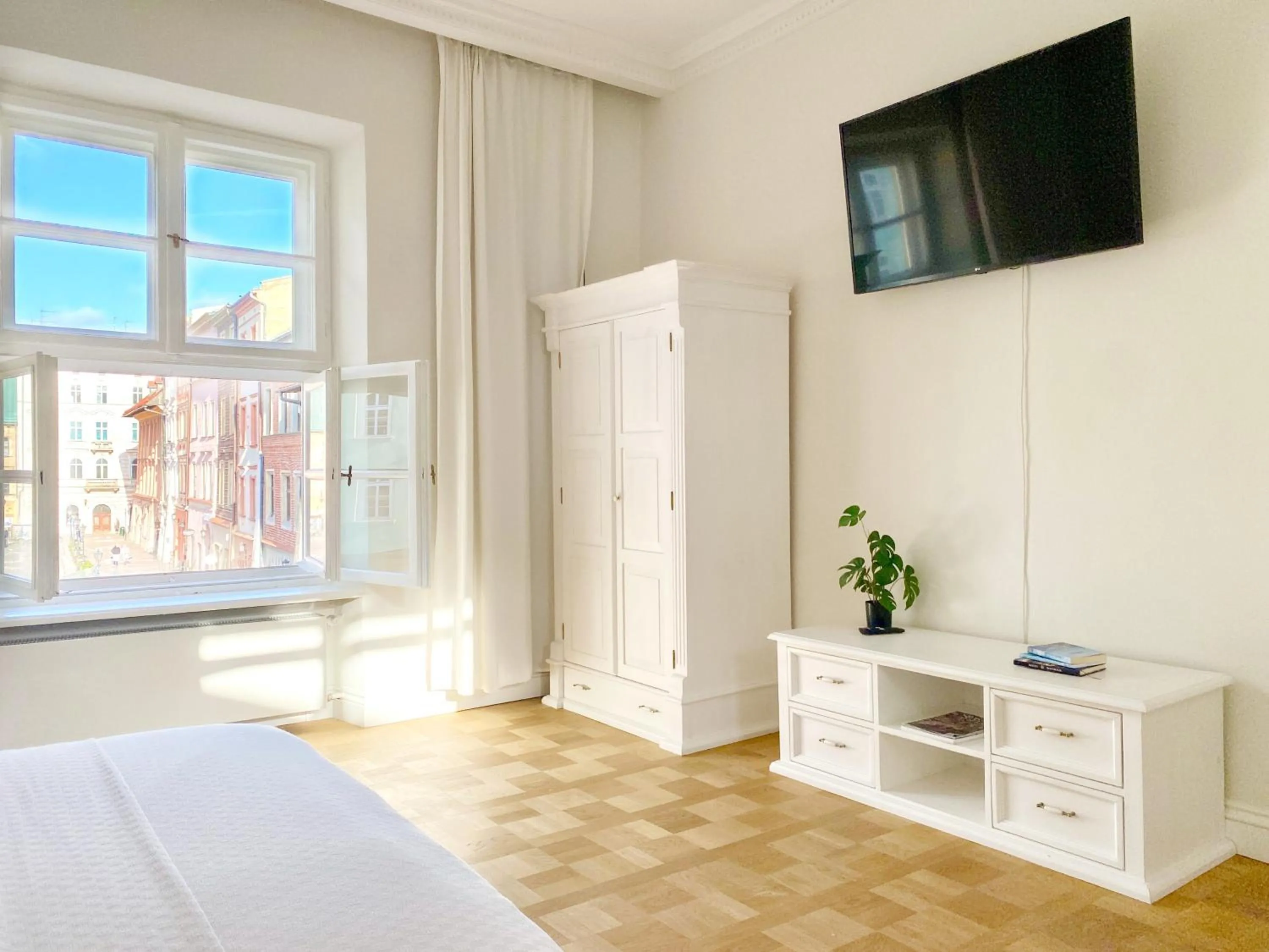 Bed in MINT Luxury Apartments at the Main Square