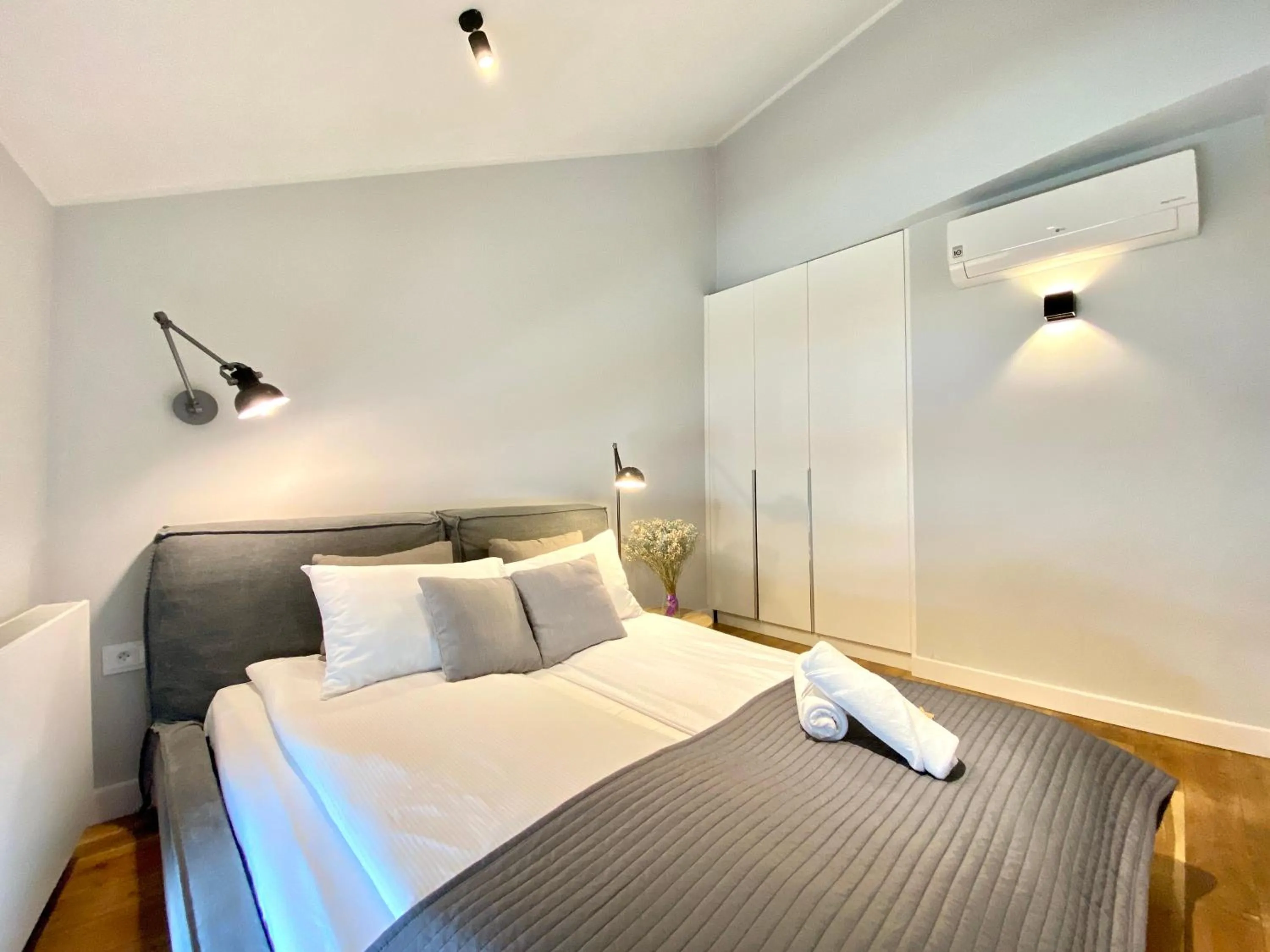 Bed in MINT Luxury Apartments at the Main Square