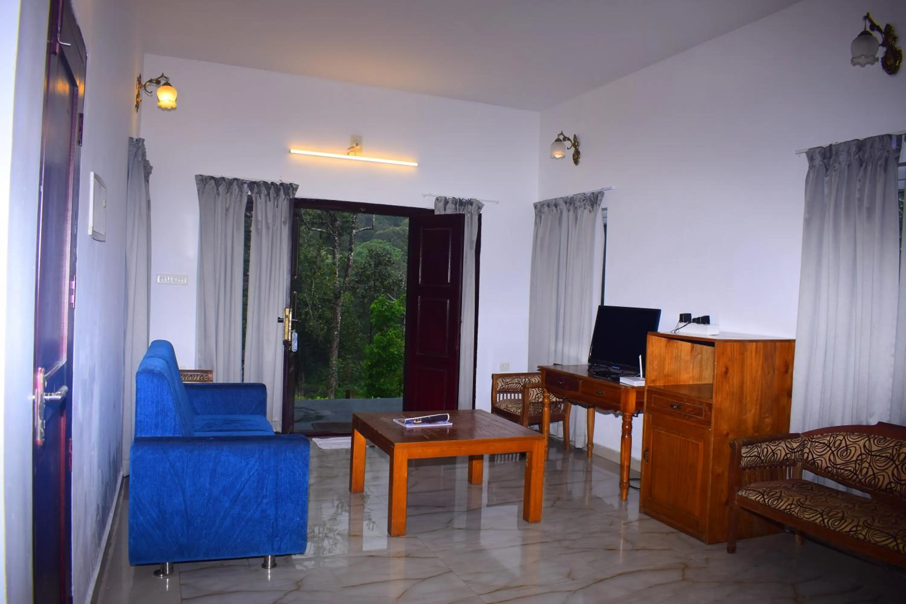 Living room in Elixir Woods Luxury Resort And Spa, Munnar