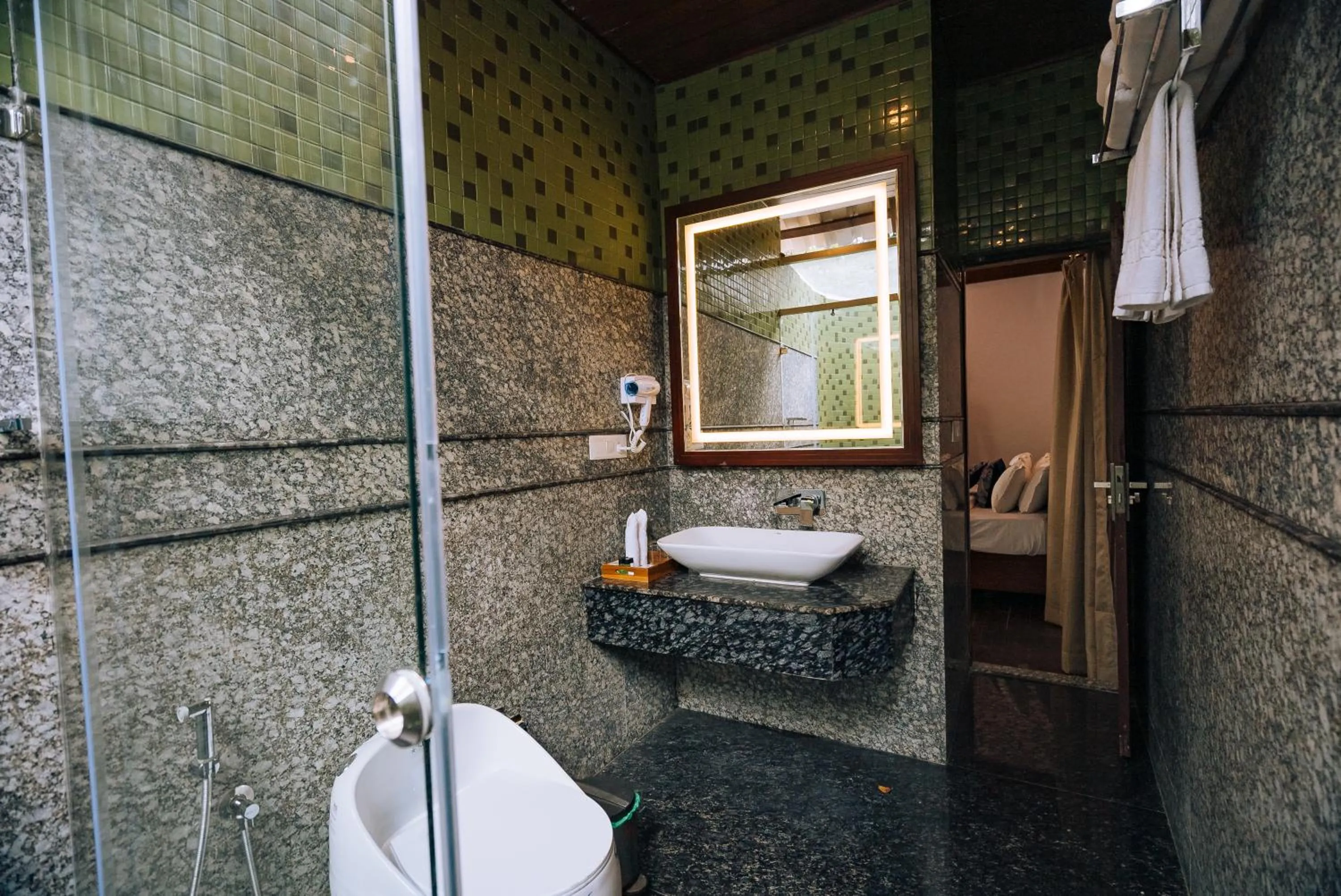 Shower in Elixir Woods Luxury Resort And Spa, Munnar