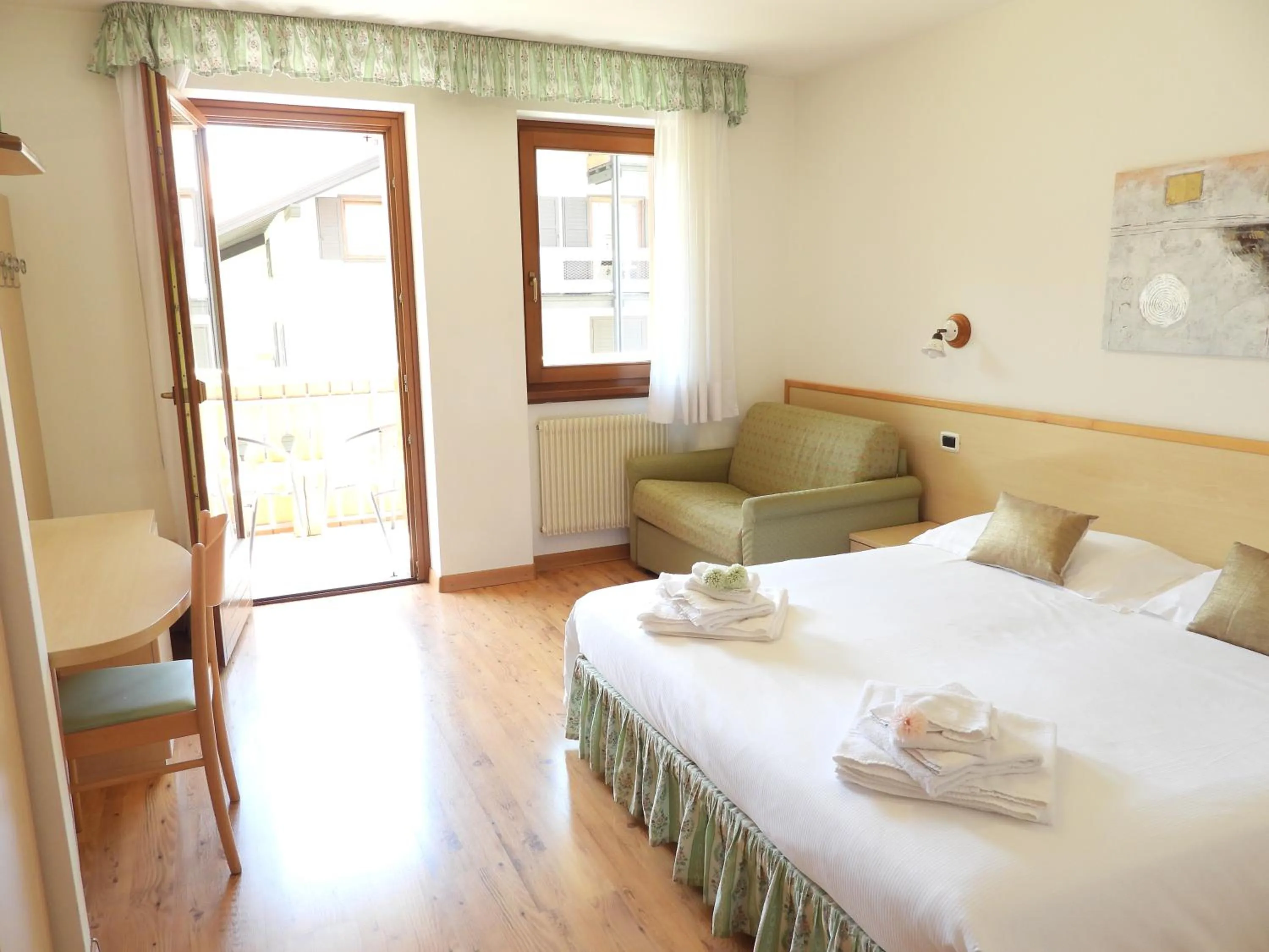 Bed in Hotel Garnì Maffei