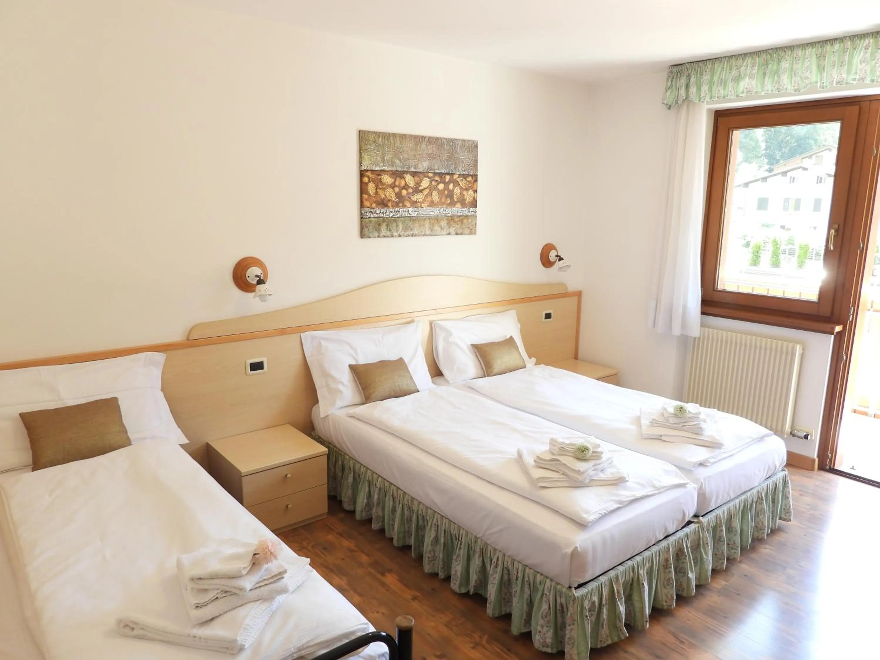 Bed in Hotel Garnì Maffei