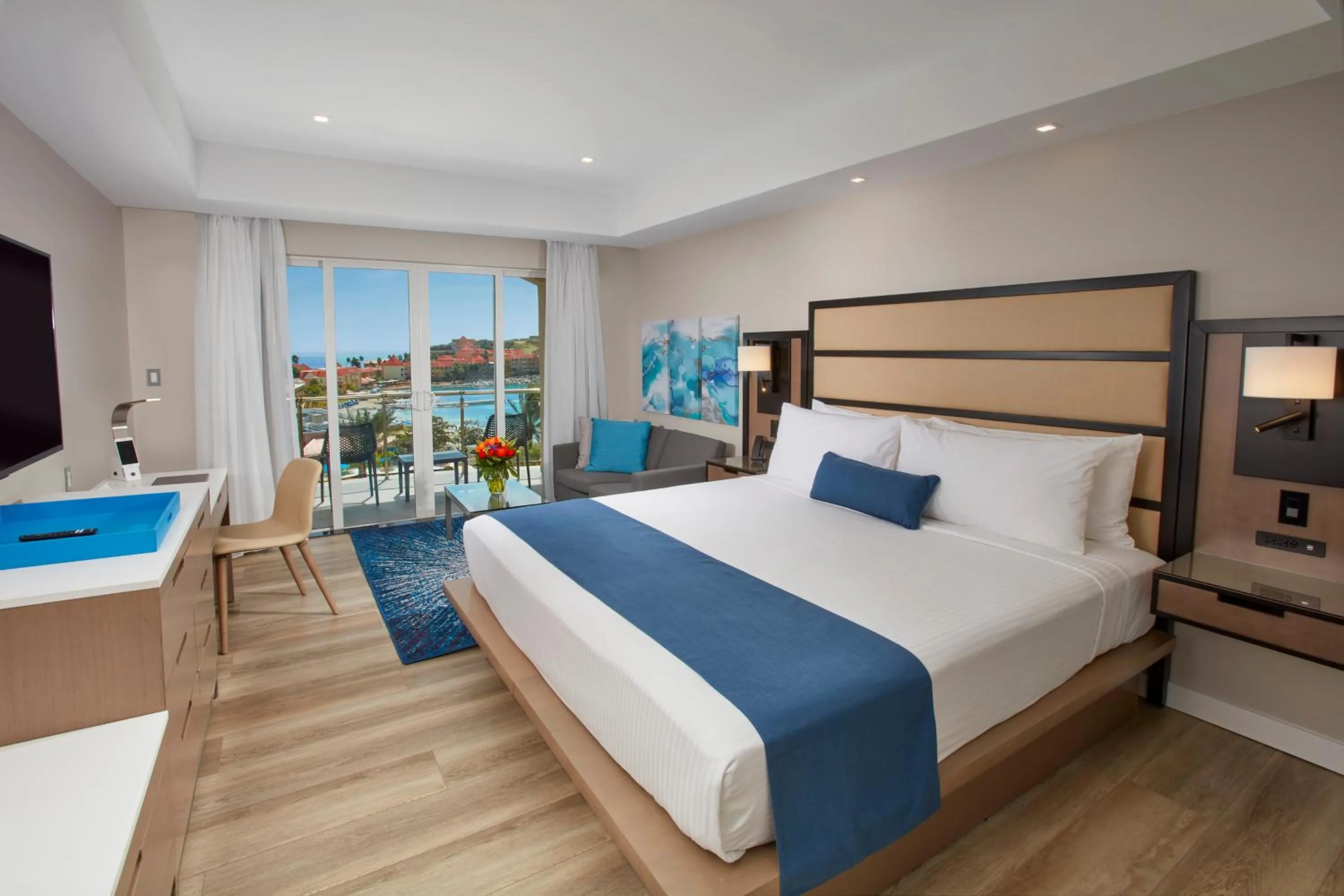 Photo of the whole room, Bed in Oceans at Divi Little Bay