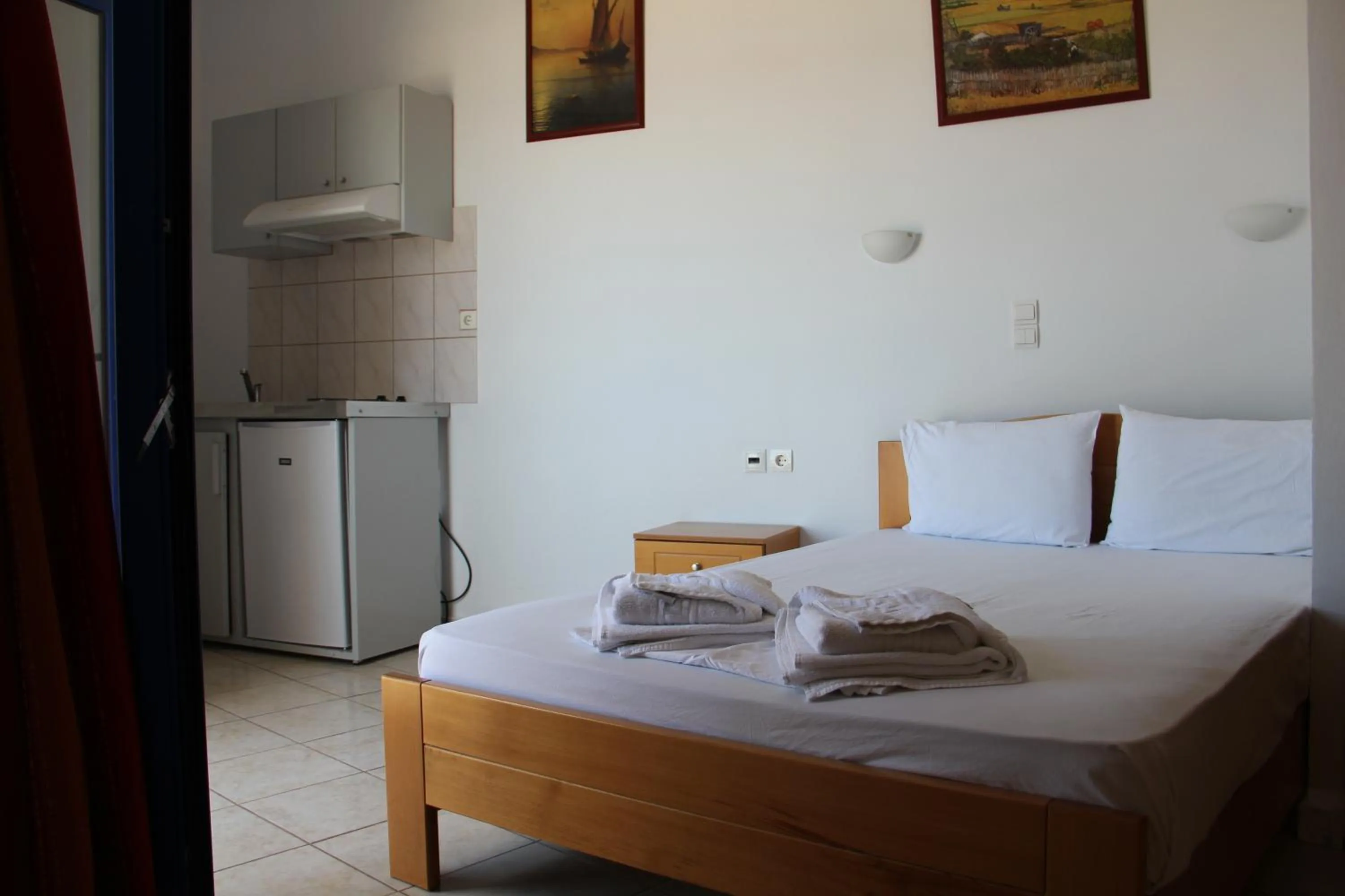 Kitchen or kitchenette, Bed in Hotel Stavris