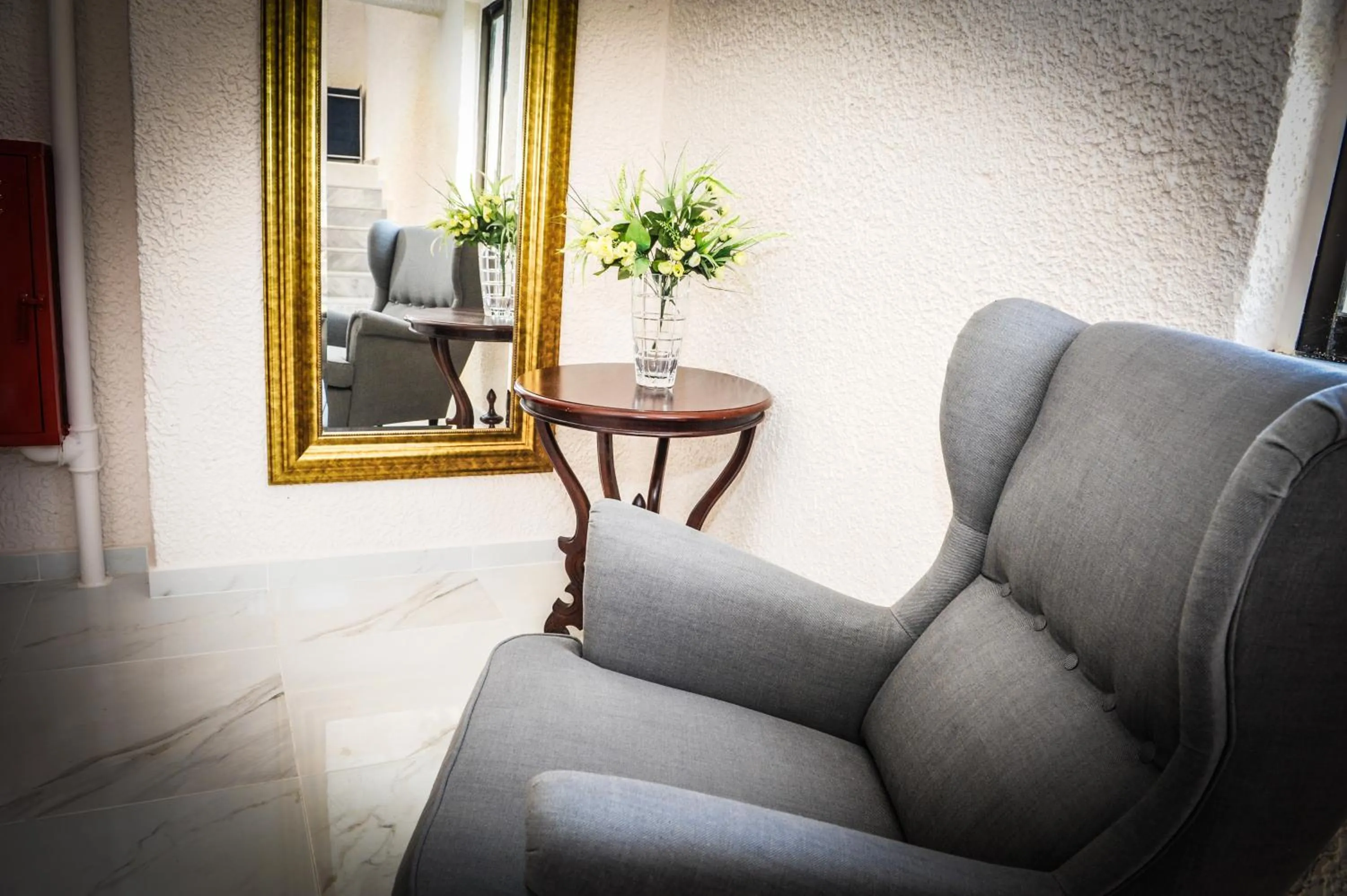 Seating area in Valentino Hotel