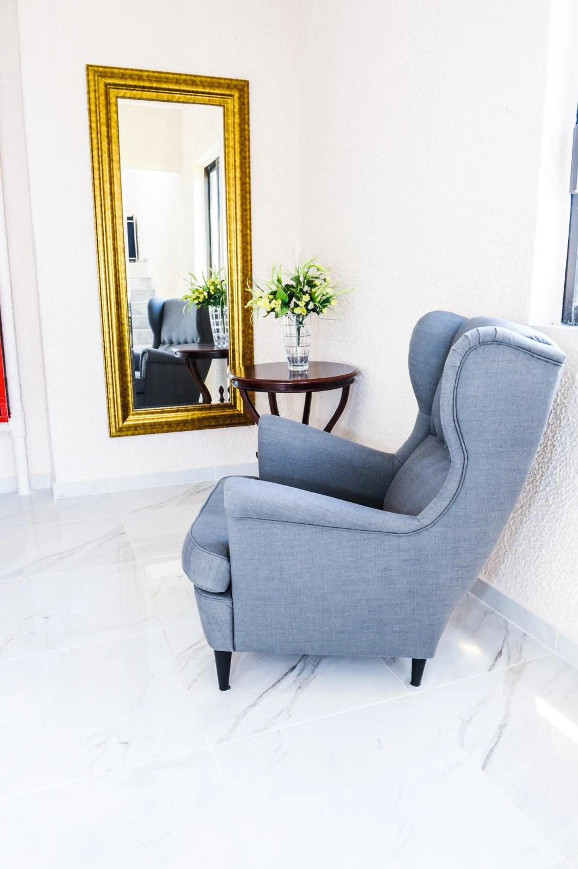 Seating area in Valentino Hotel