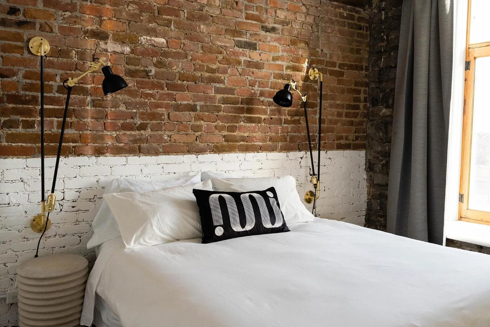 Bed in Maison Place Royale by Luxury In Transit