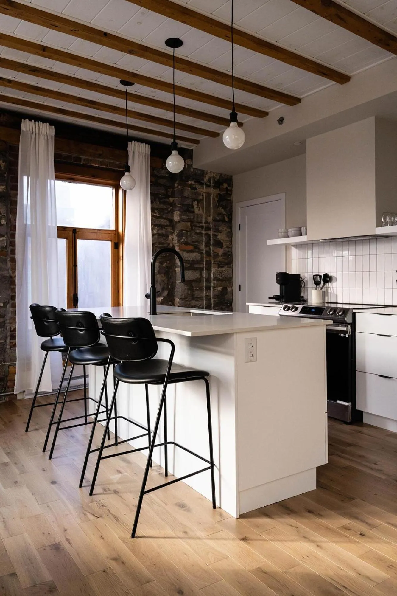 Kitchen or kitchenette in Maison Place Royale by Luxury In Transit