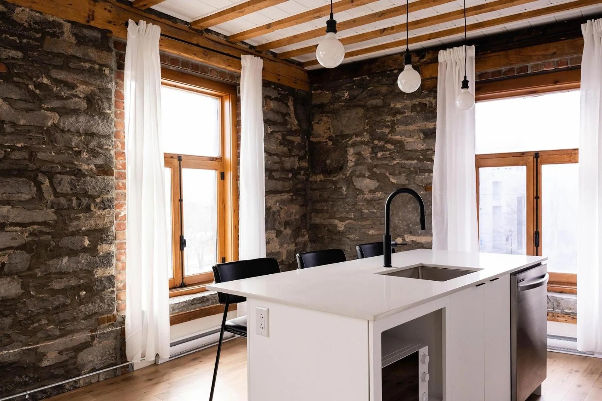 Kitchen or kitchenette in Maison Place Royale by Luxury In Transit