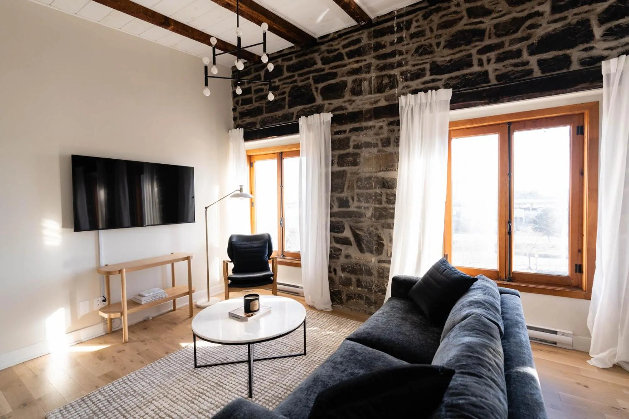 TV and multimedia in Maison Place Royale by Luxury In Transit