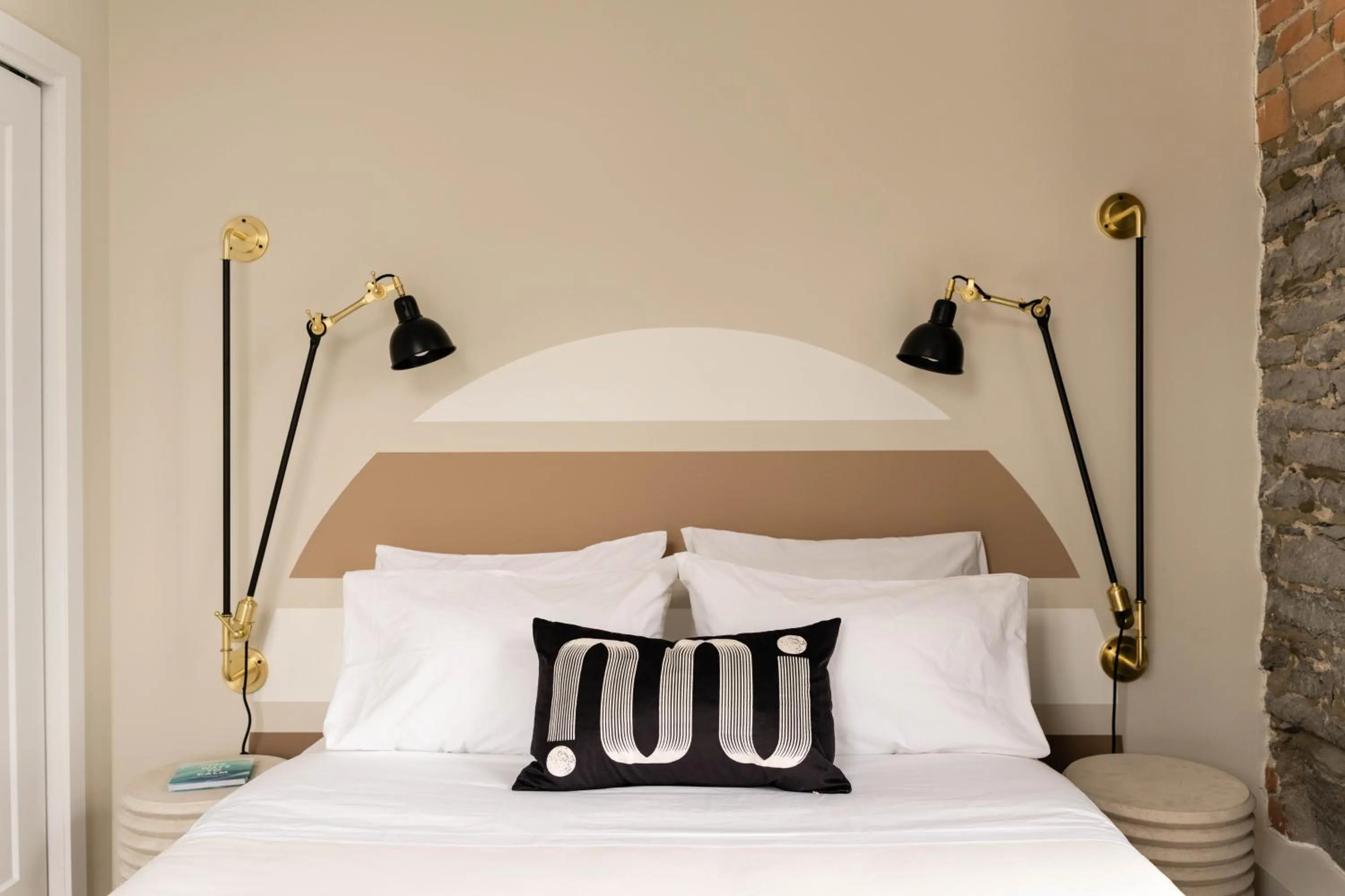 Bed in Maison Place Royale by Luxury In Transit