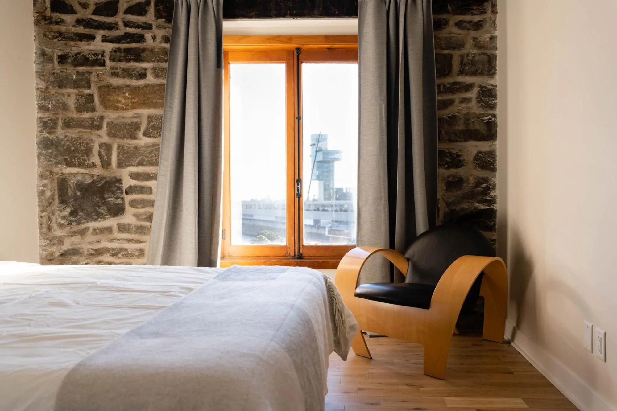 Bed in Maison Place Royale by Luxury In Transit