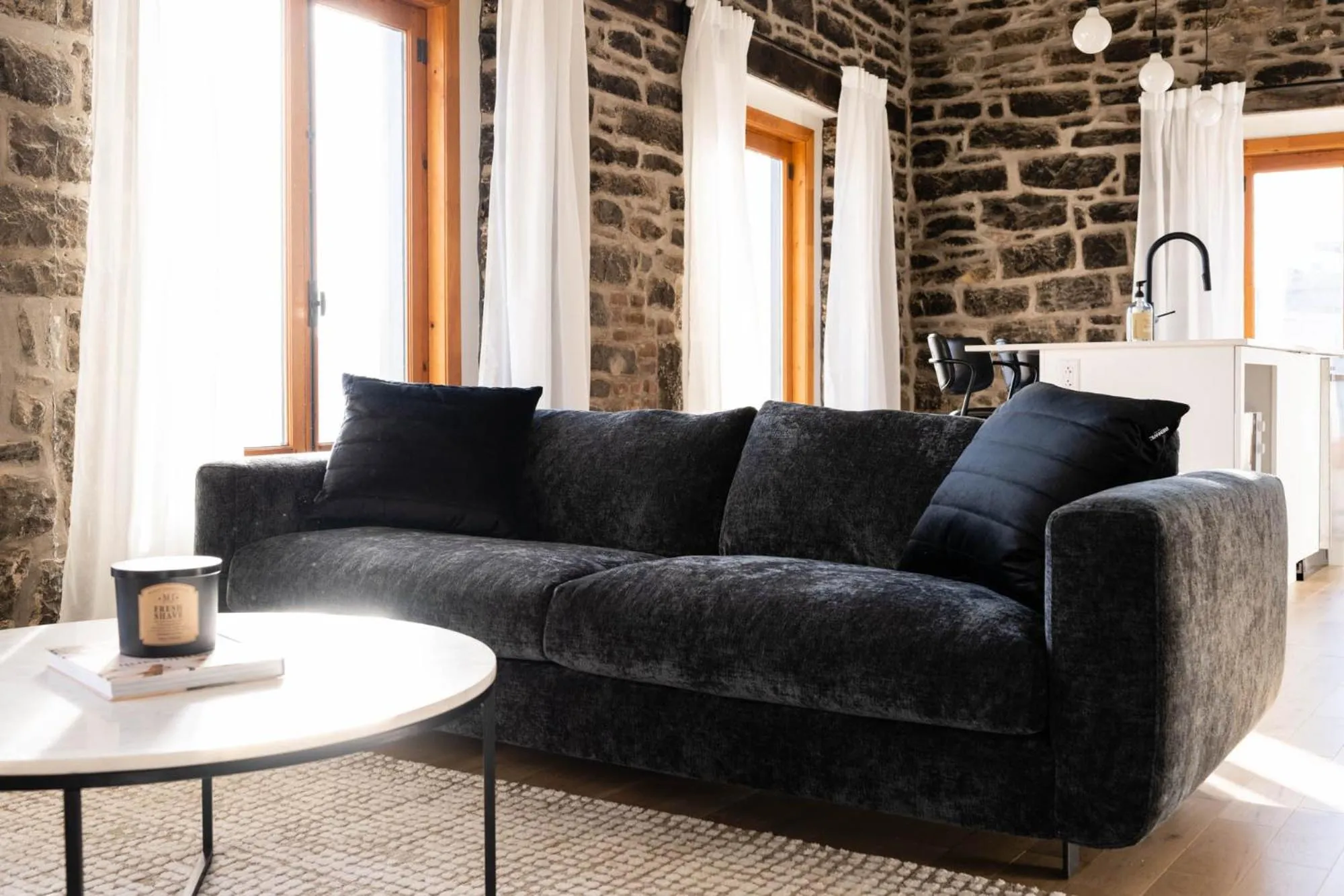 Living room in Maison Place Royale by Luxury In Transit