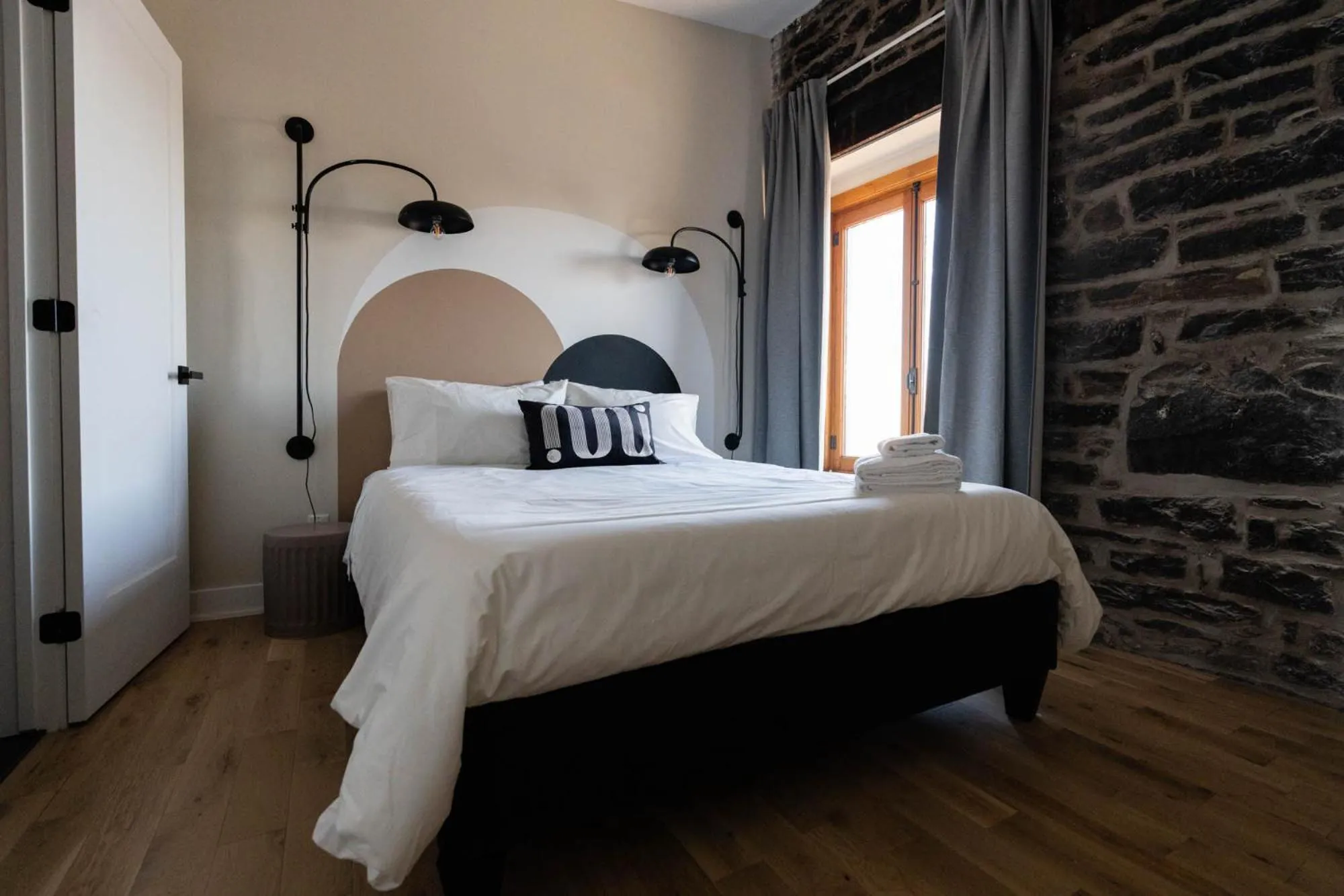 Bed in Maison Place Royale by Luxury In Transit