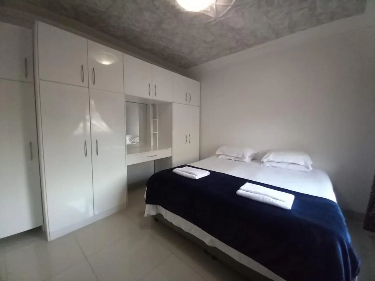 Bedroom, Bed in Loddey`s Guest House - by Beach Collection