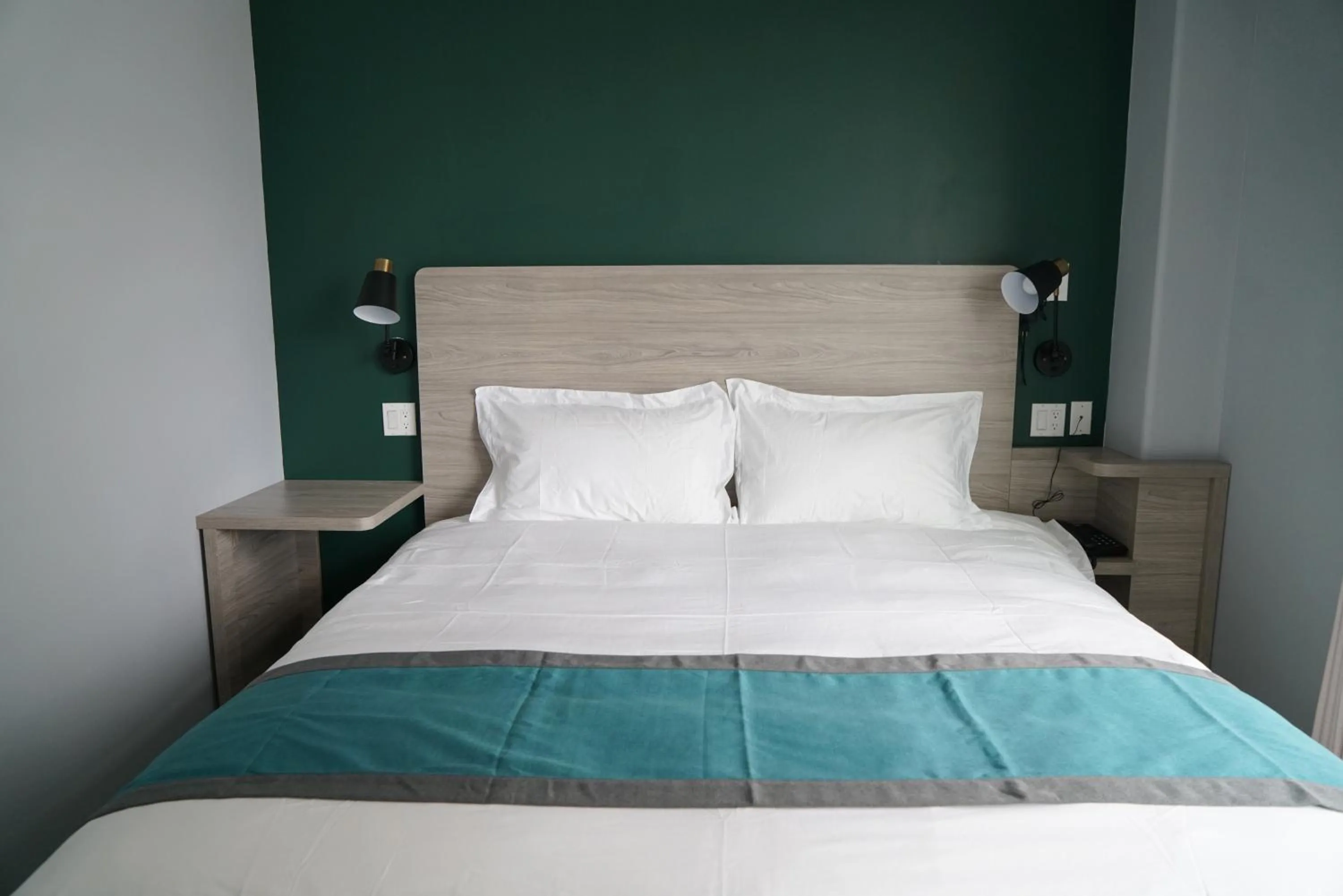 Bed in Starlight Hotel