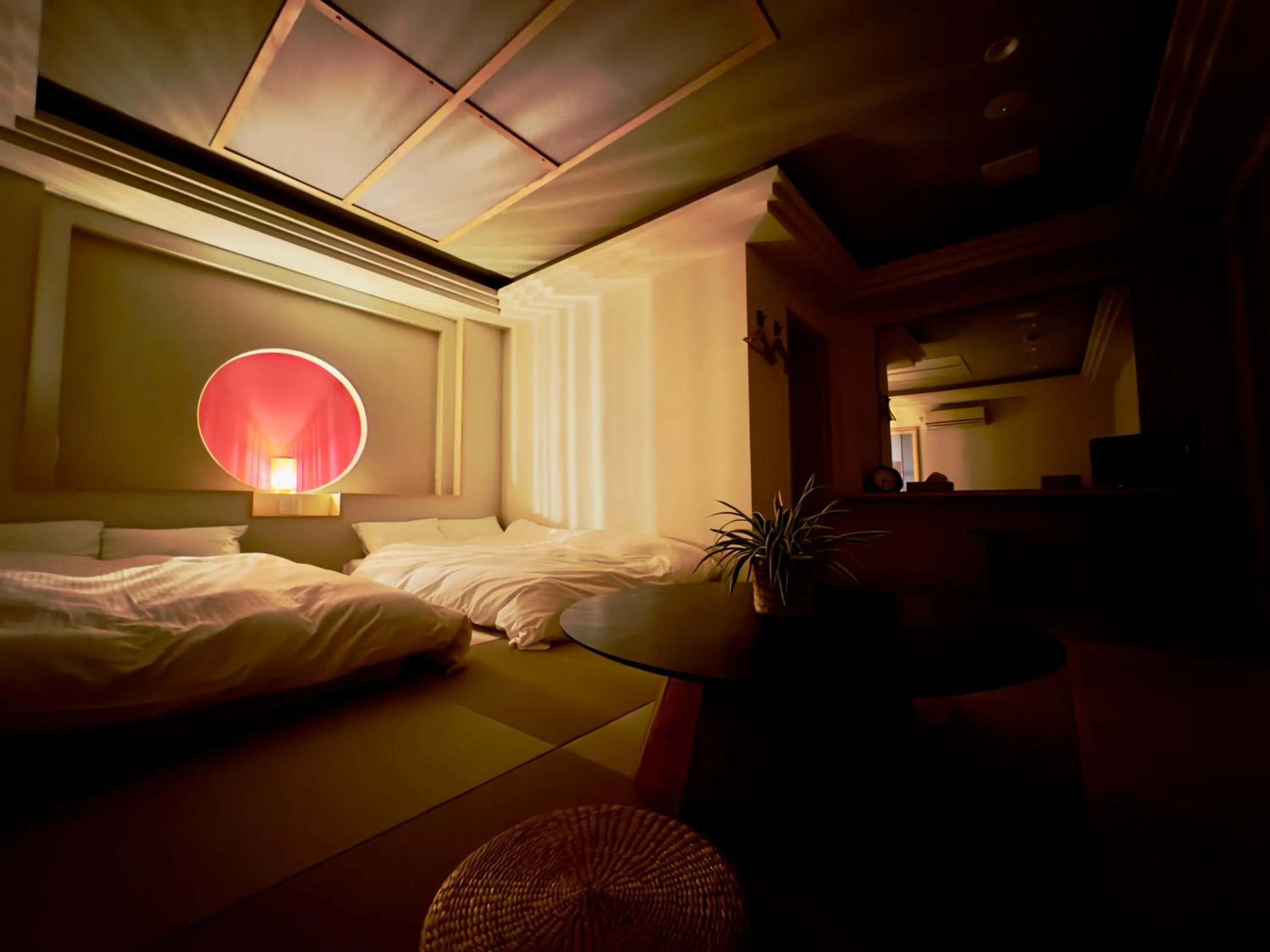 Bed in Hotel Ishigaki and Chikonkiya