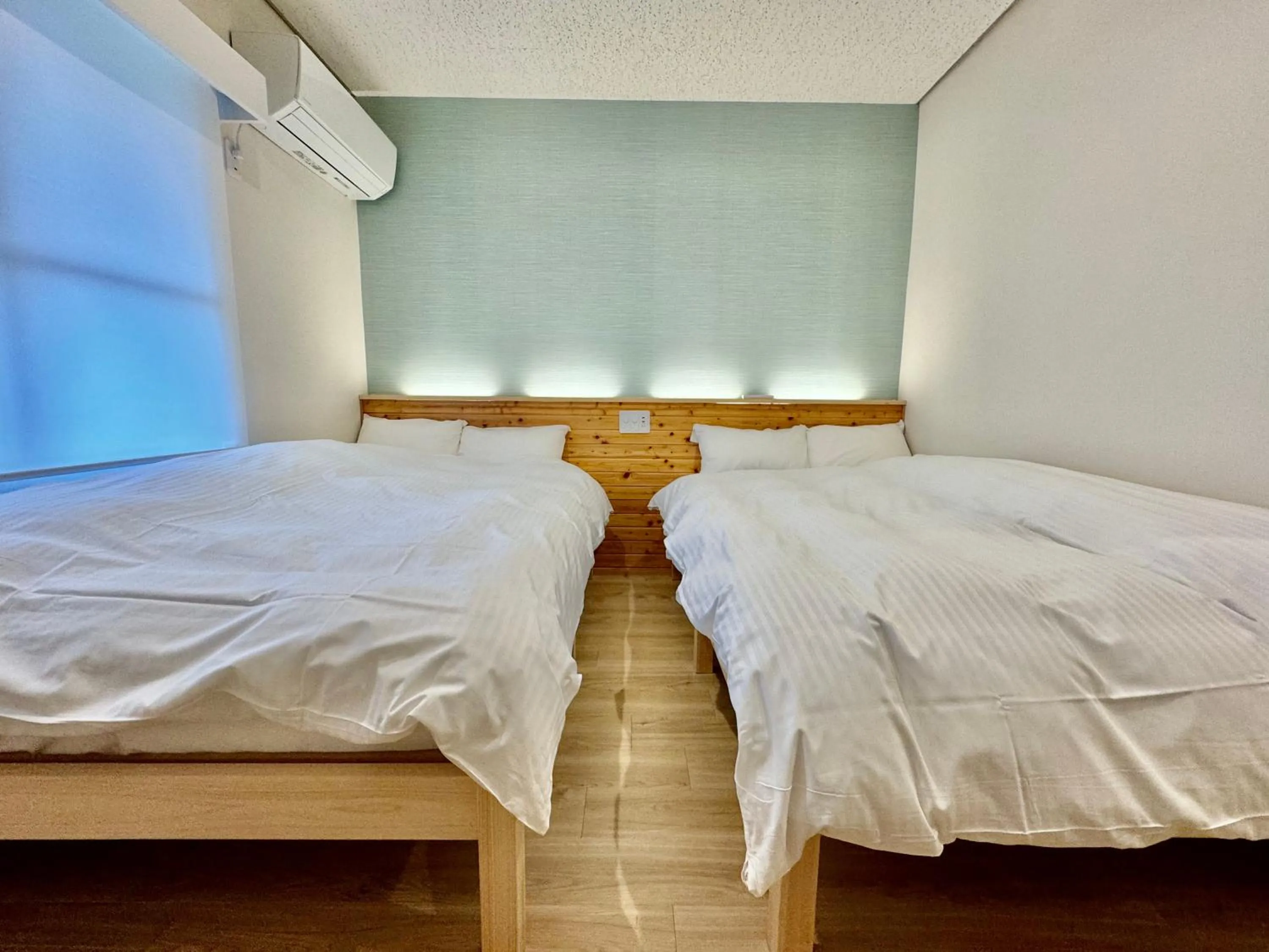 Bed in Hotel Ishigaki and Chikonkiya