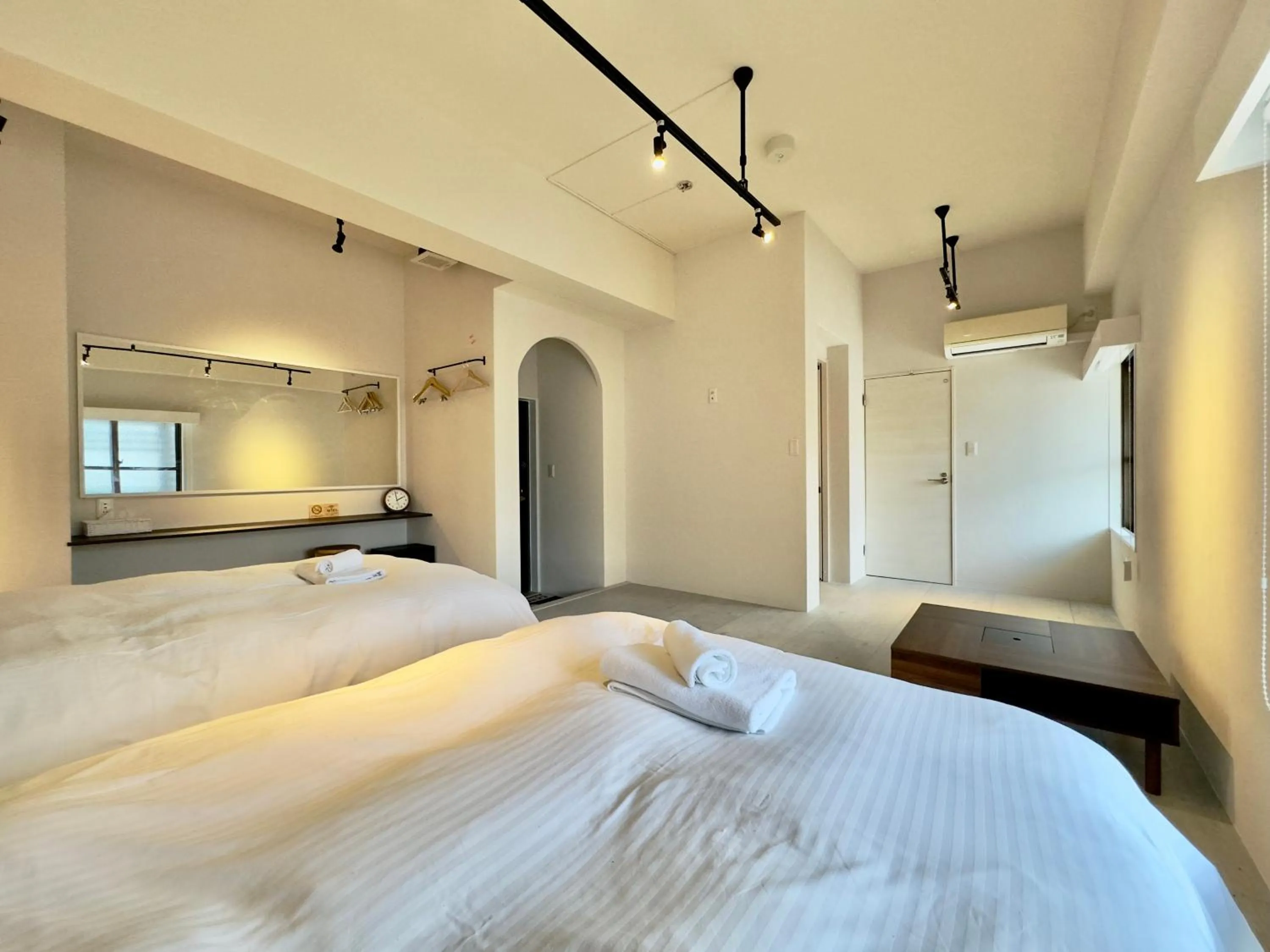 Bed in Hotel Ishigaki and Chikonkiya