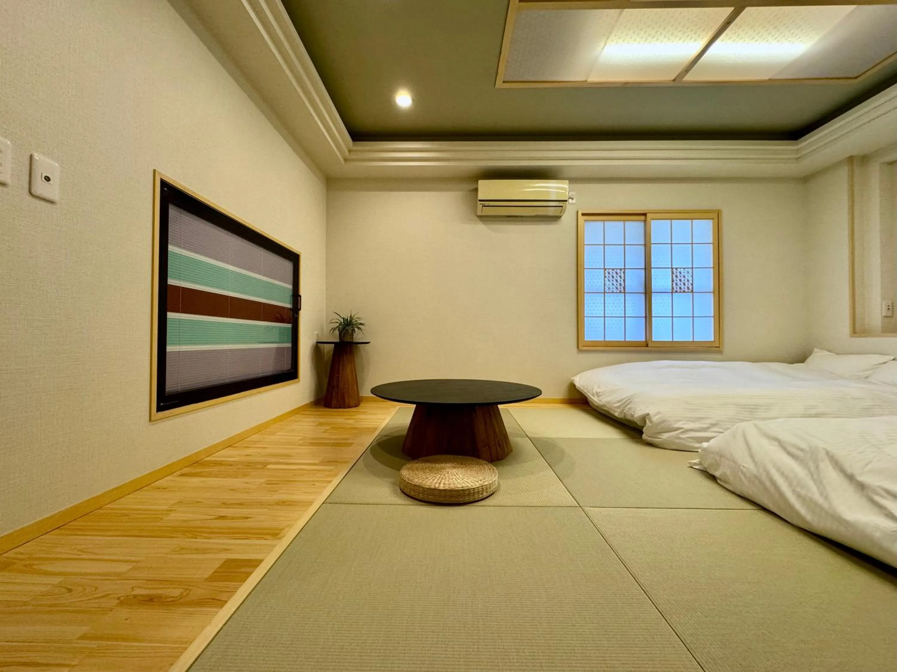 Bed in Hotel Ishigaki and Chikonkiya