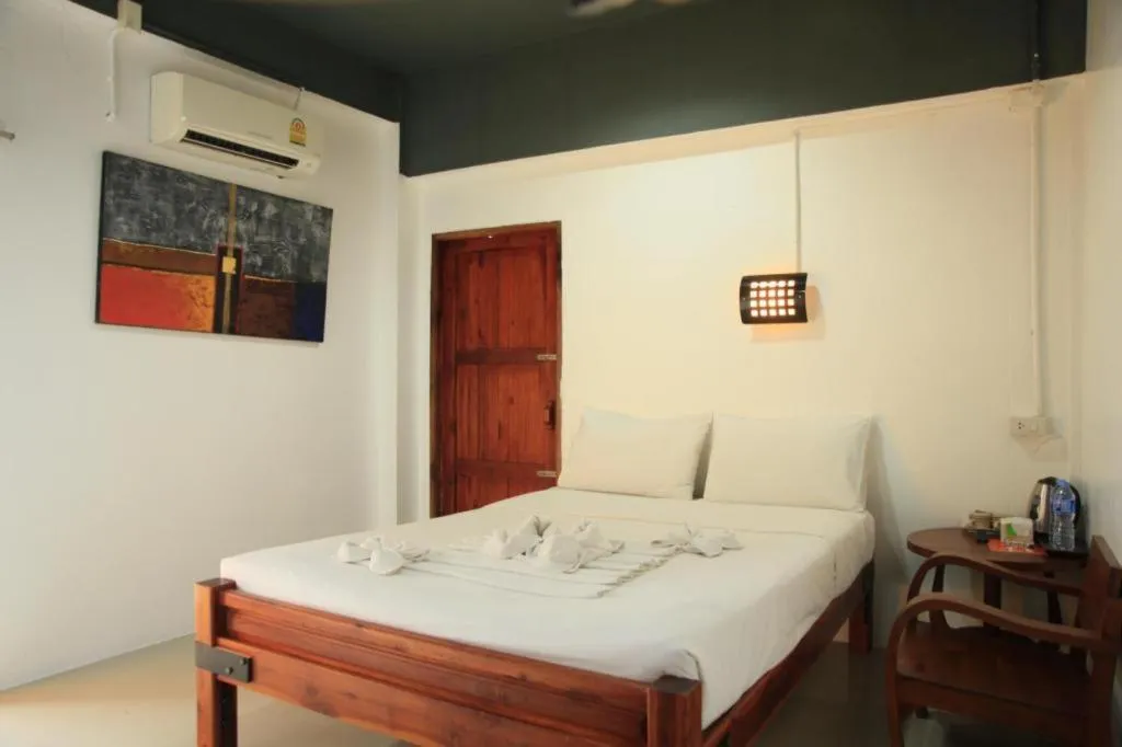 Bed in Hometel Hotel