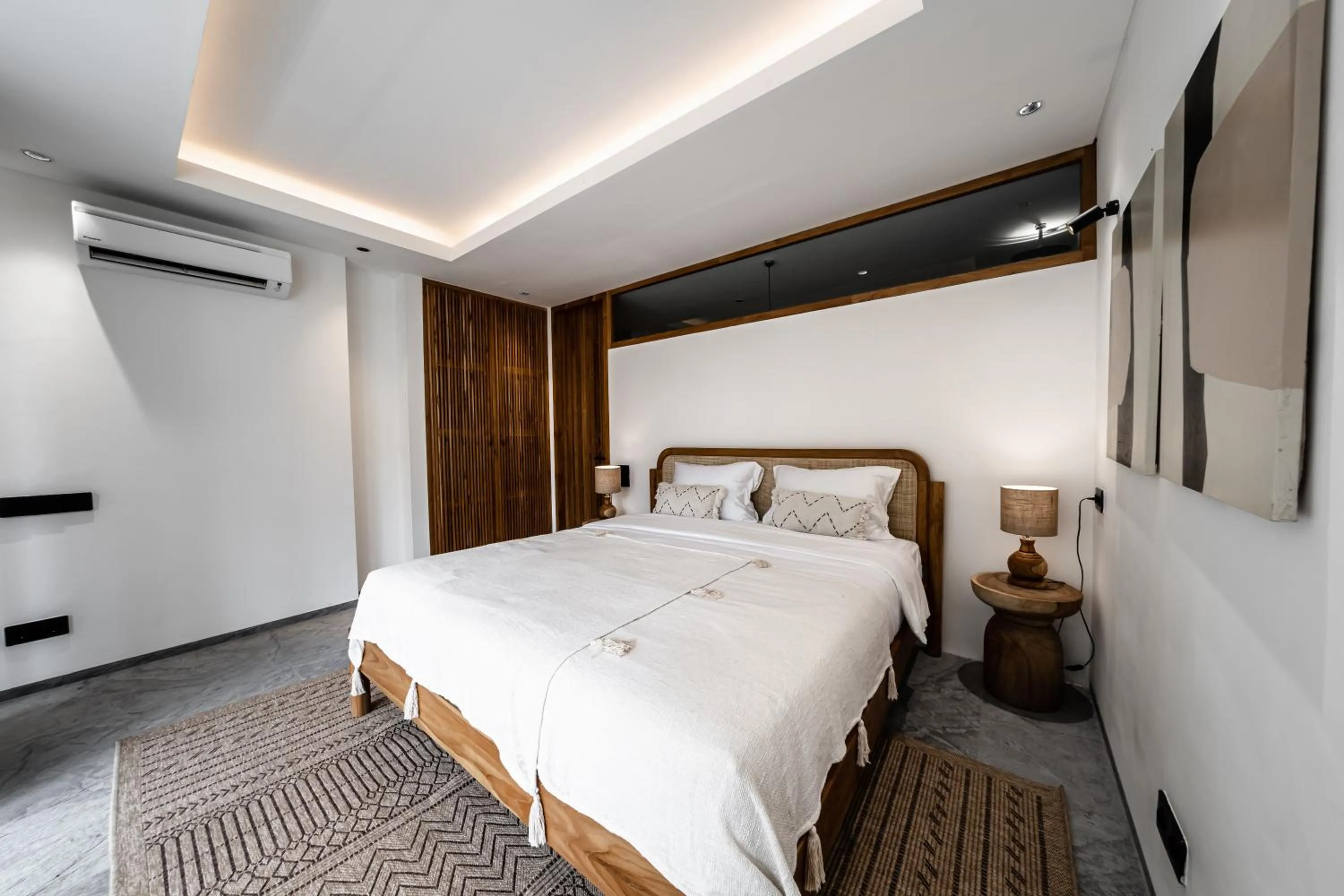 Bed in Happiness Apartments Bali Ubud