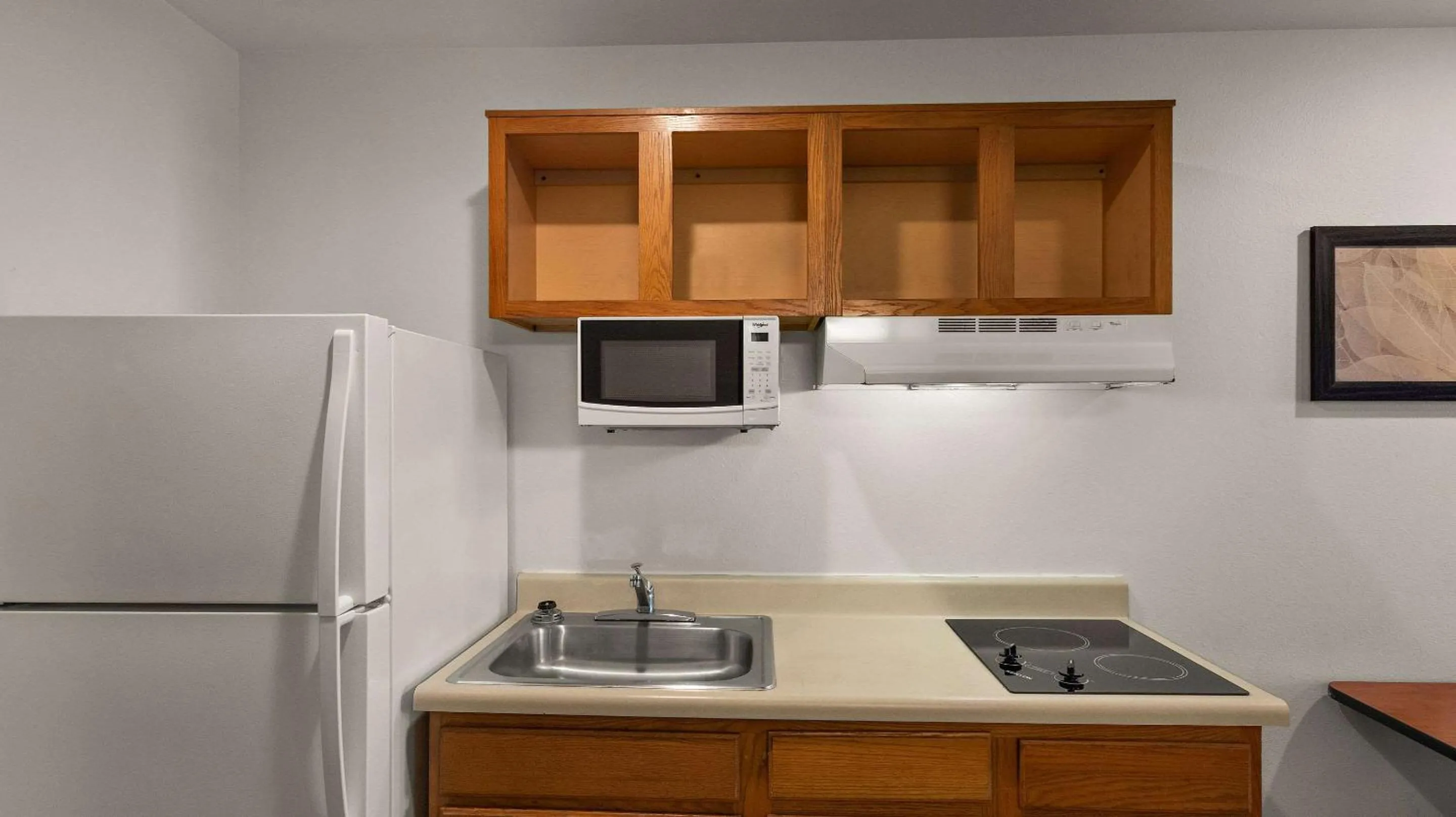 Bedroom in WoodSpring Suites Evansville