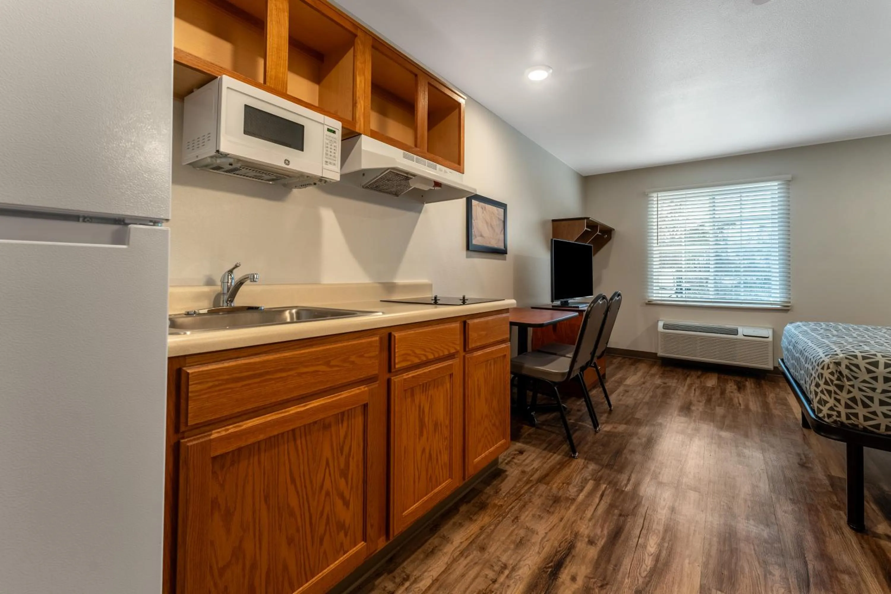 kitchen in WoodSpring Suites Macon North