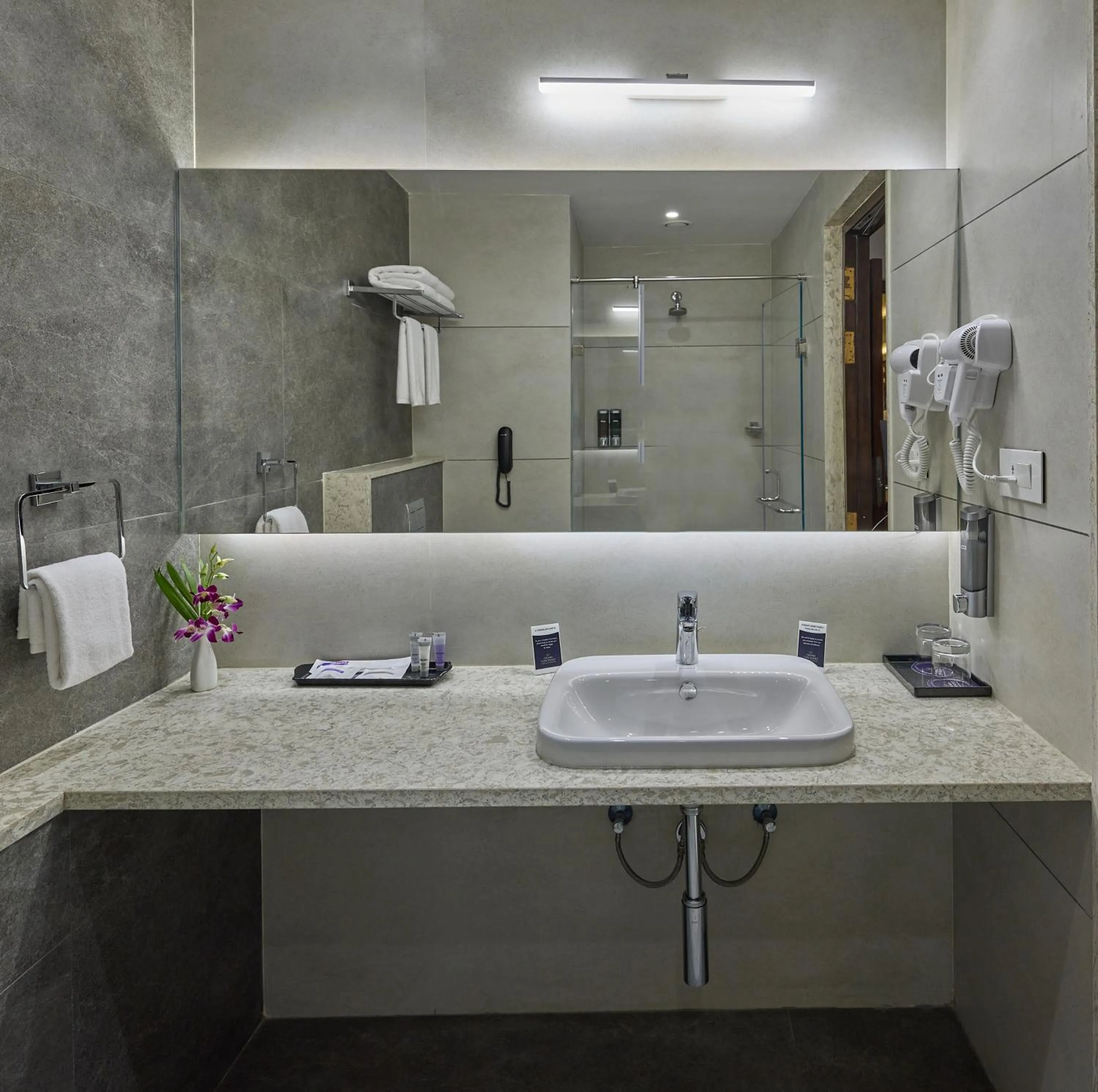 Bathroom in Grand Continent Hosur A Sarovar Portico Affiliate Hotel