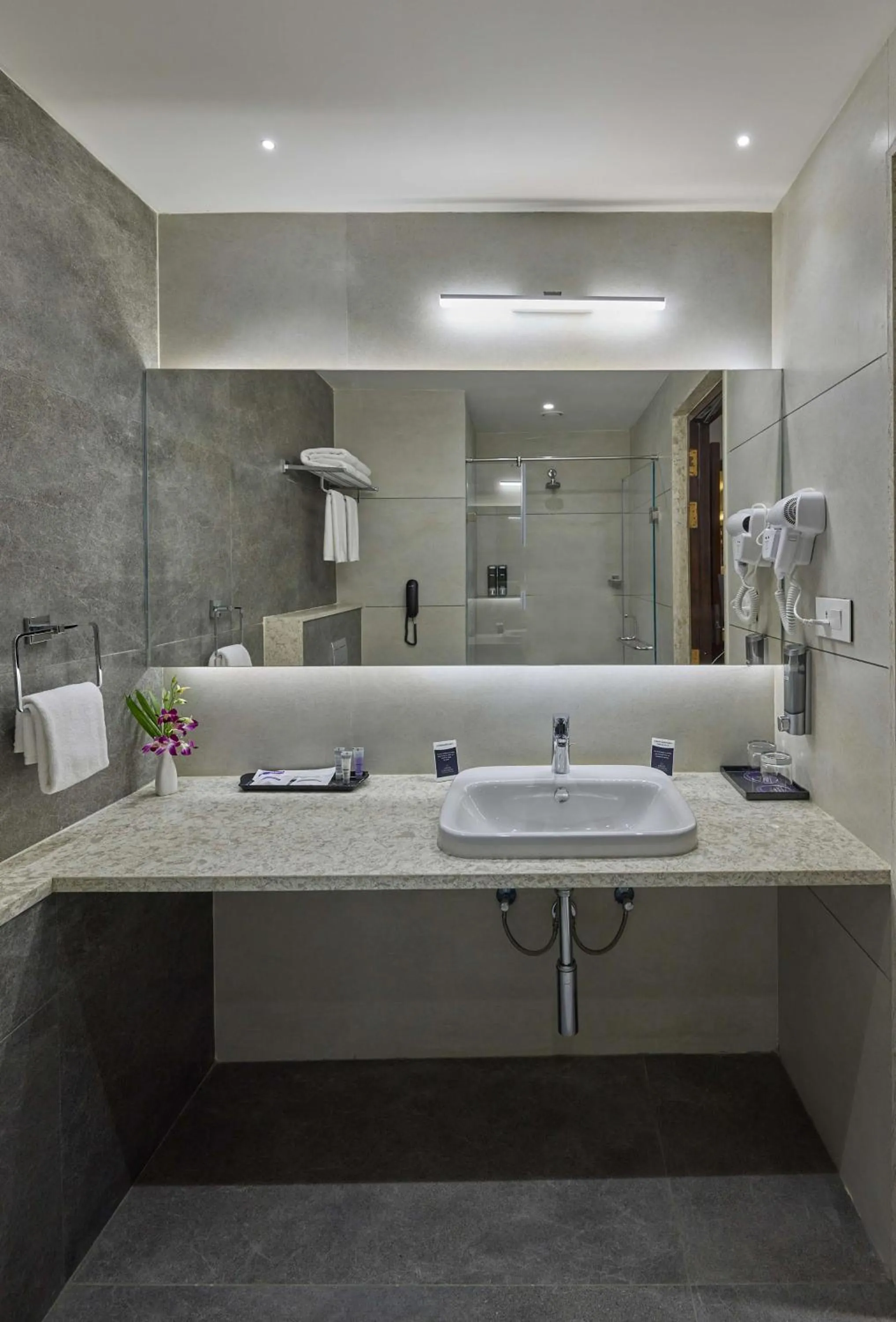 Bathroom in Grand Continent Hosur A Sarovar Portico Affiliate Hotel